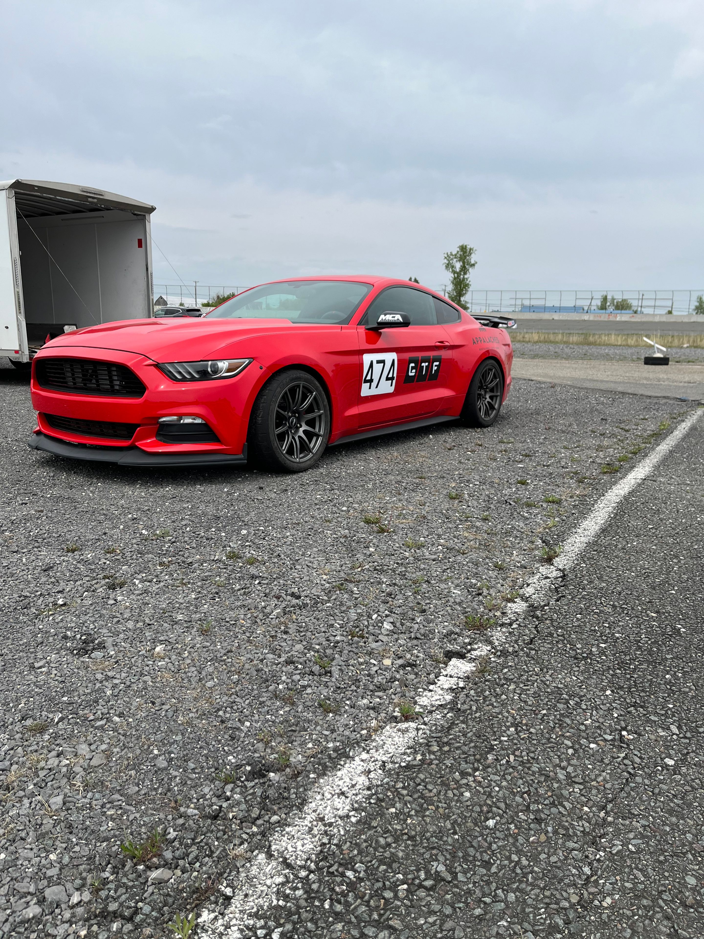 Red Ford S550 Mustang GT with 18" SM-10 Apex wheels in Anthracite