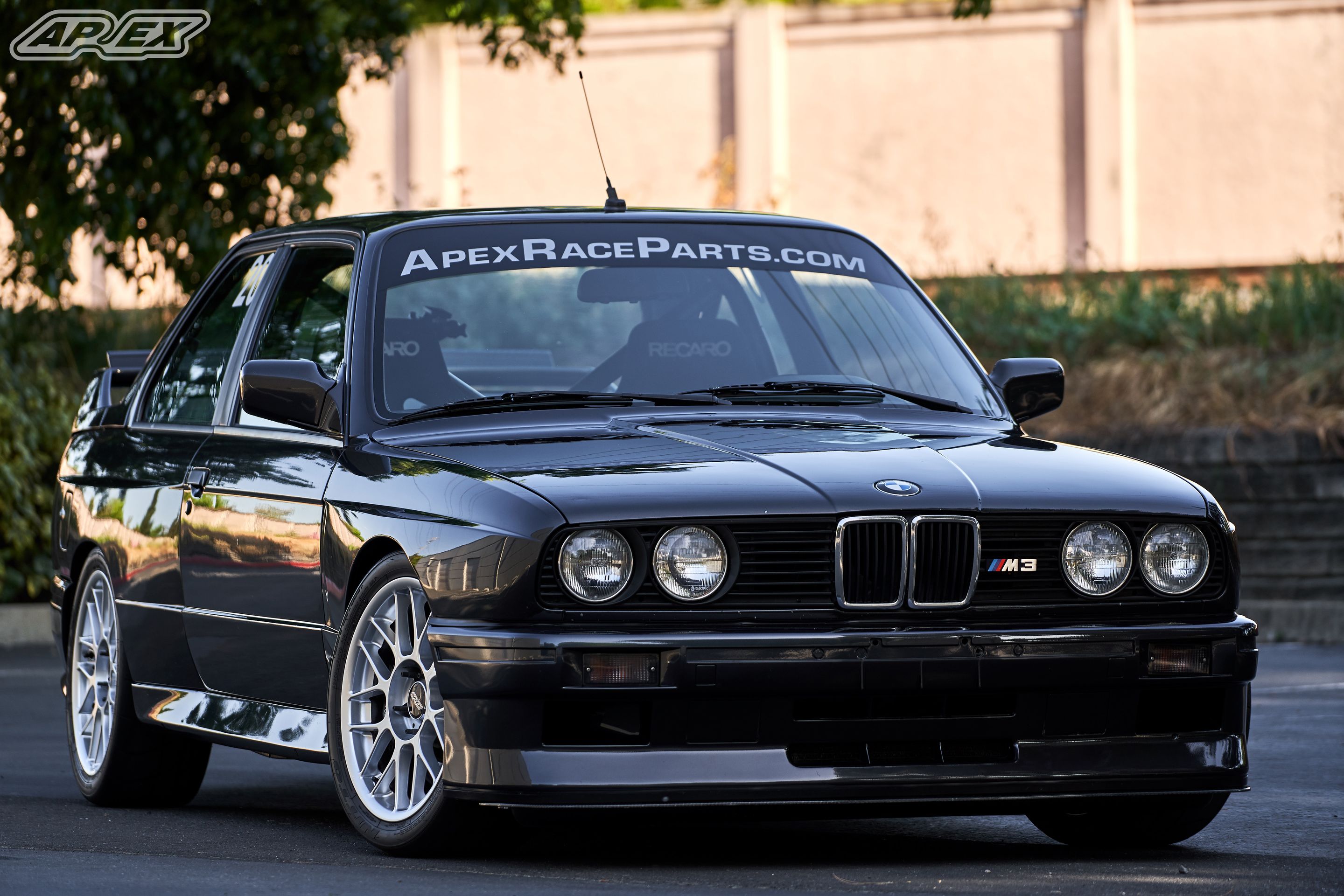 Black BMW E30 M3 with 17" ARC-8 Apex wheels in Hyper Silver