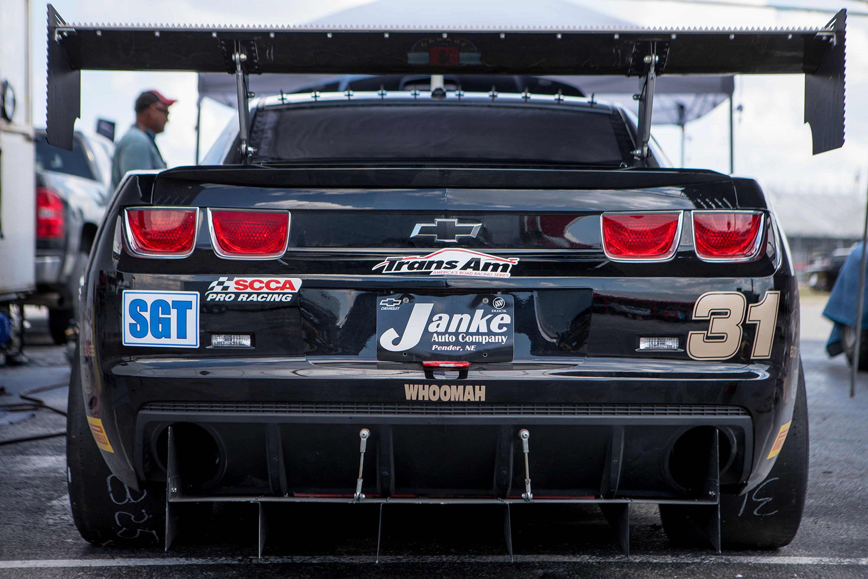 Black Chevrolet 5th Gen Camaro SS with 18" EC-7 Apex wheels in Anthracite