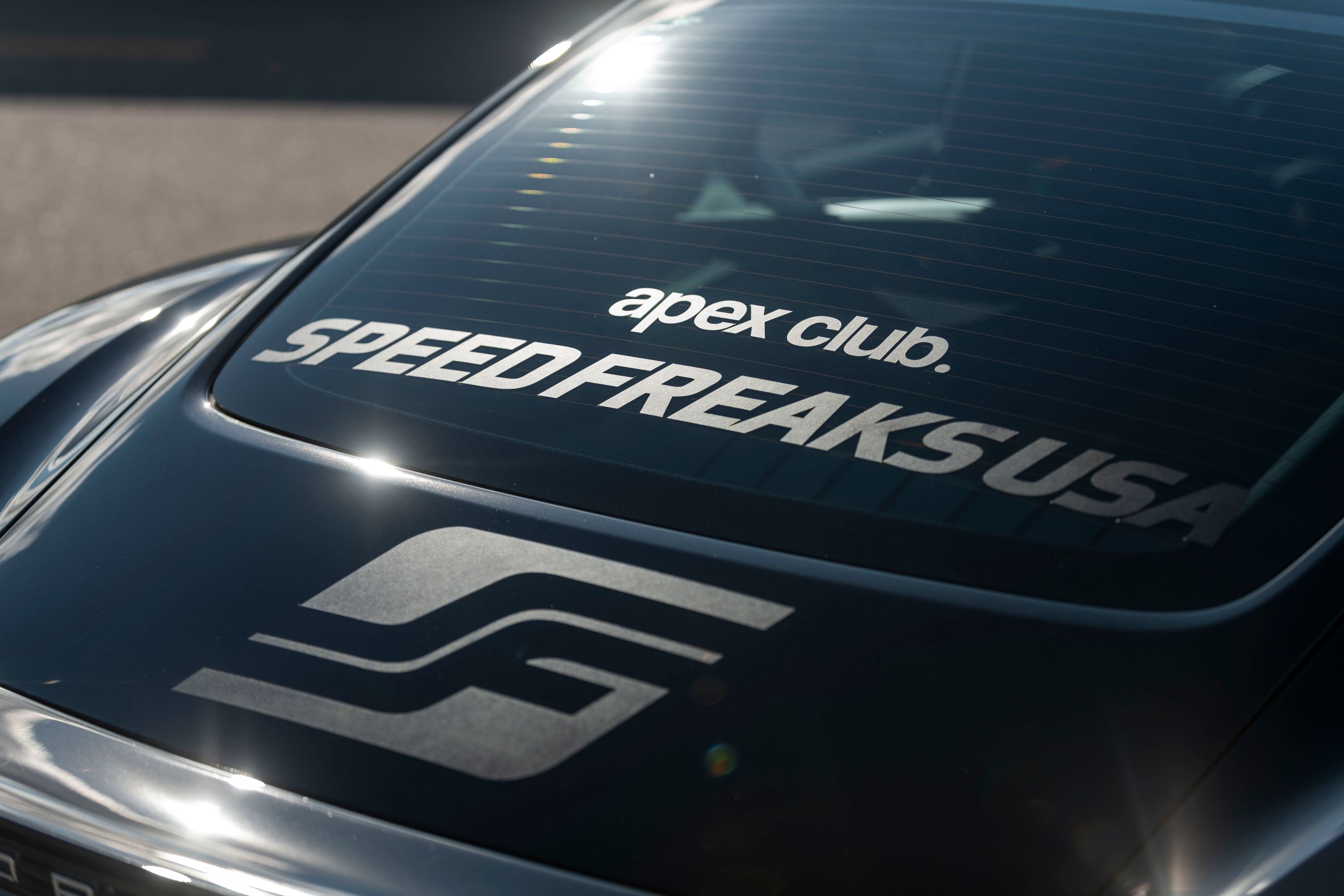 Black Porsche 718 Cayman T with 18" VS-5RS Apex wheels in Brushed Clear