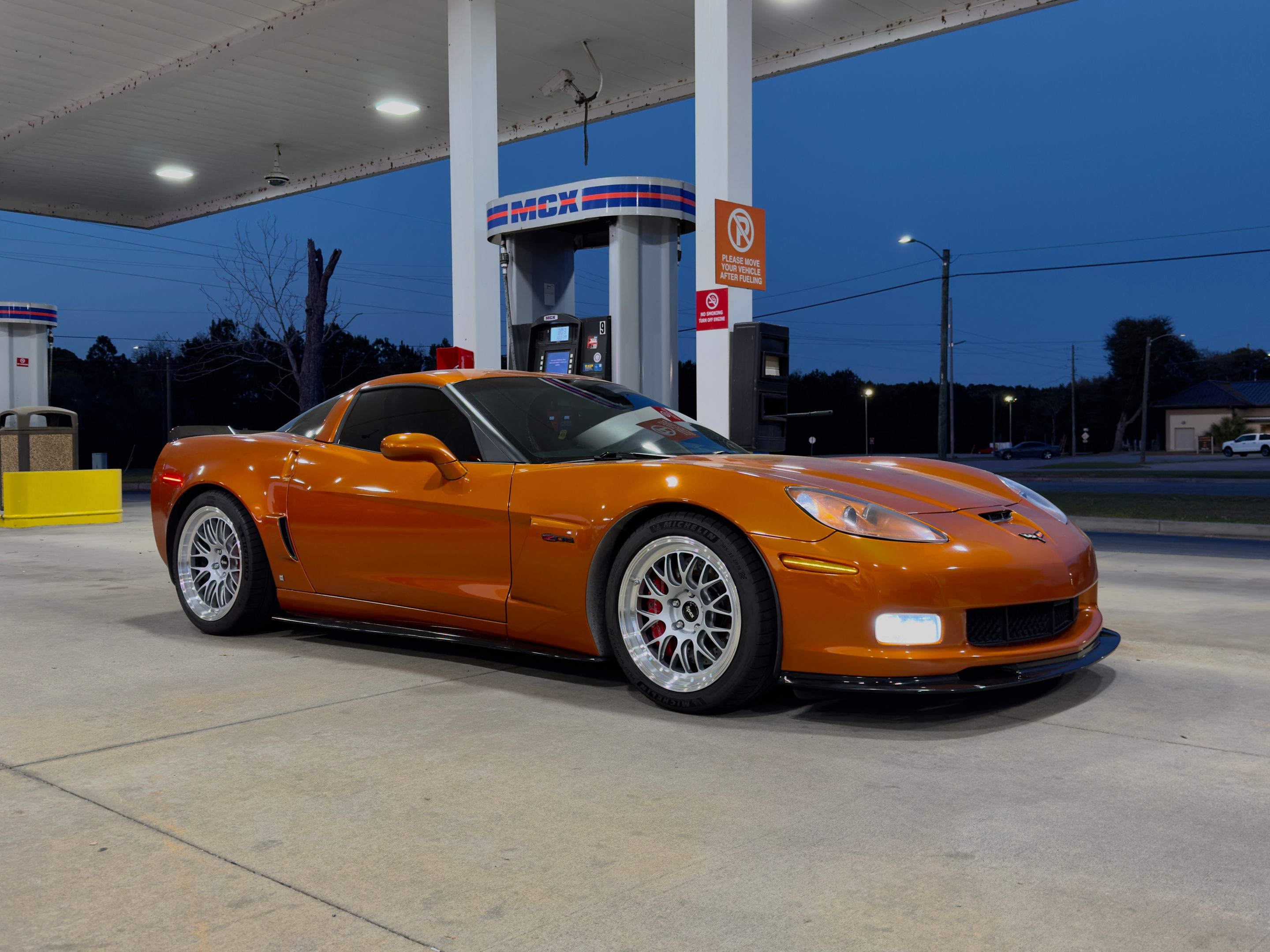 Orange Chevrolet C6 Corvette Z06 with 18"/19" ML-10RT Apex wheels in Machined Lip Race Silver