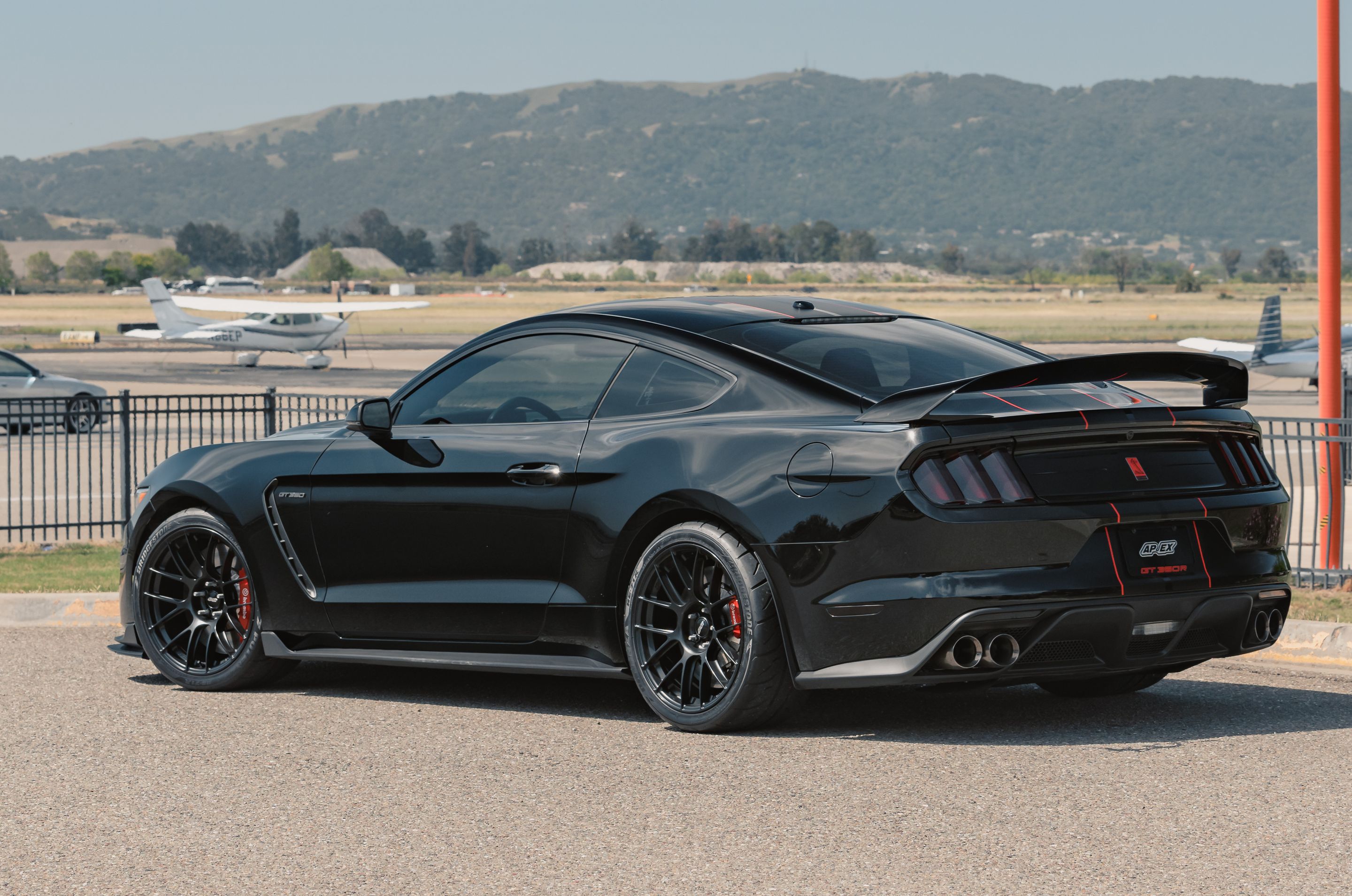 Black Ford S550 Mustang GT350 with 19" EC-7RS Apex wheels in Satin Black