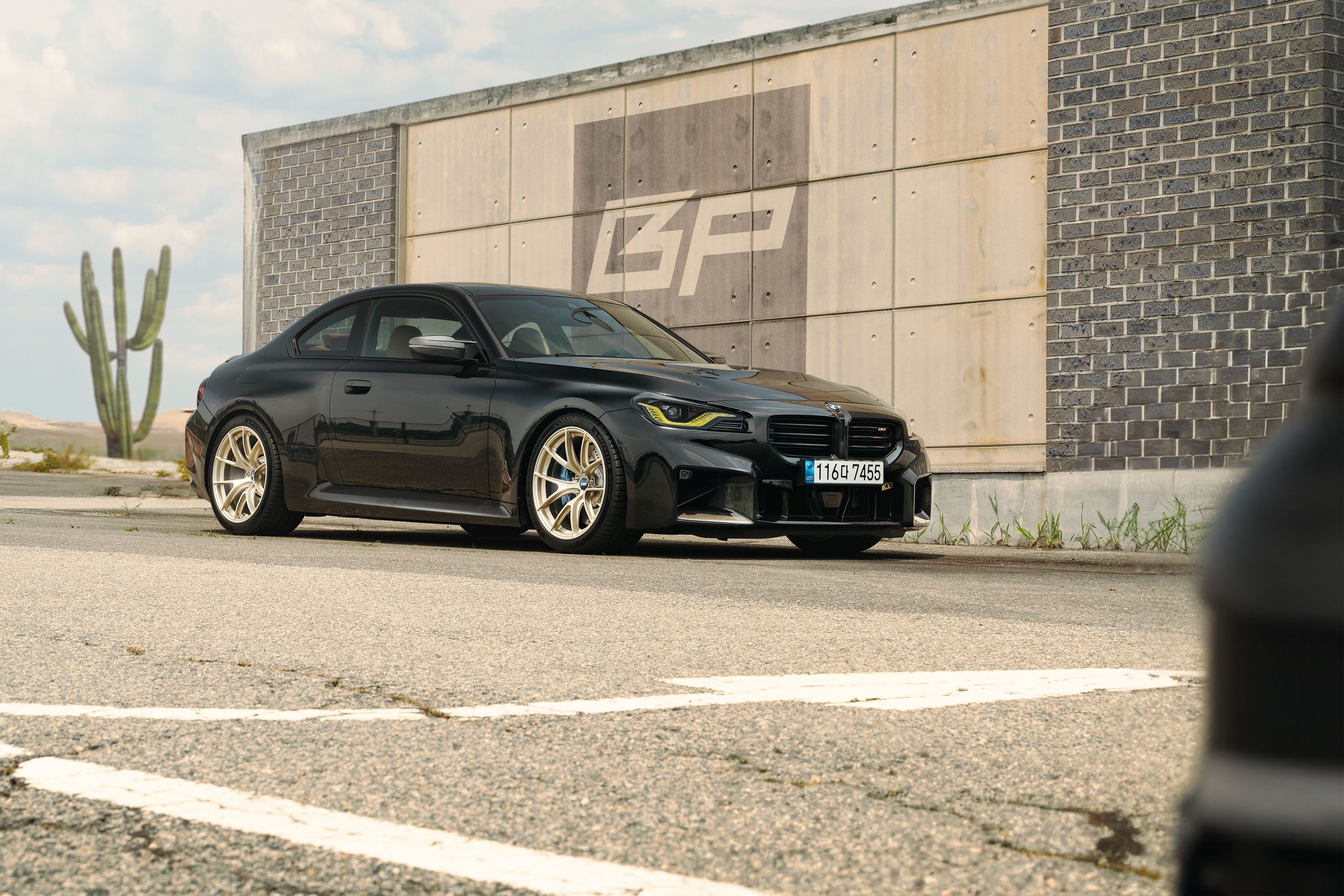 Black BMW G87 M2 with 19" VS-5RS Apex wheels in Motorsport Gold