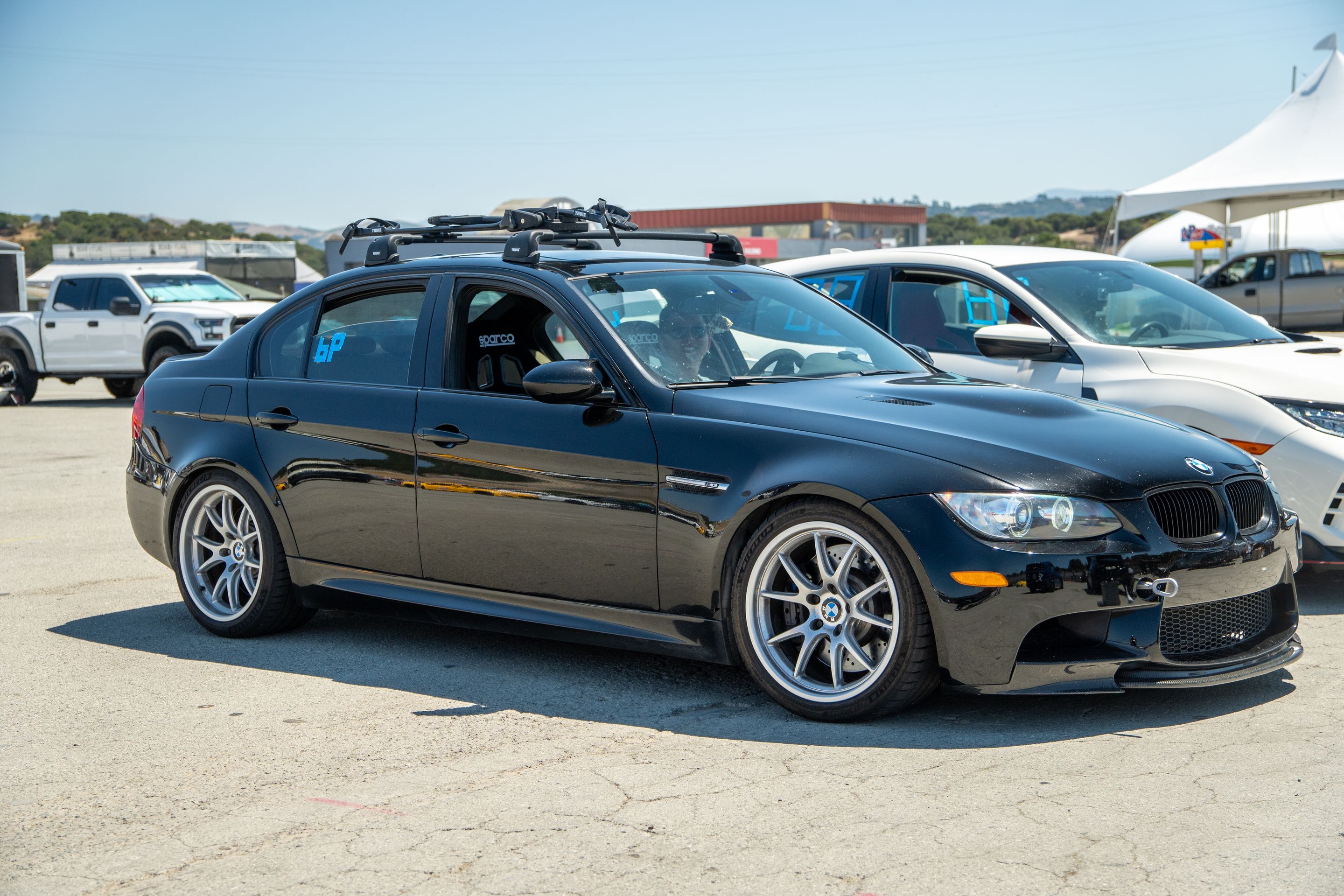 Black BMW E90 Sedan M3 with 18" FL-5 Apex wheels in Race Silver