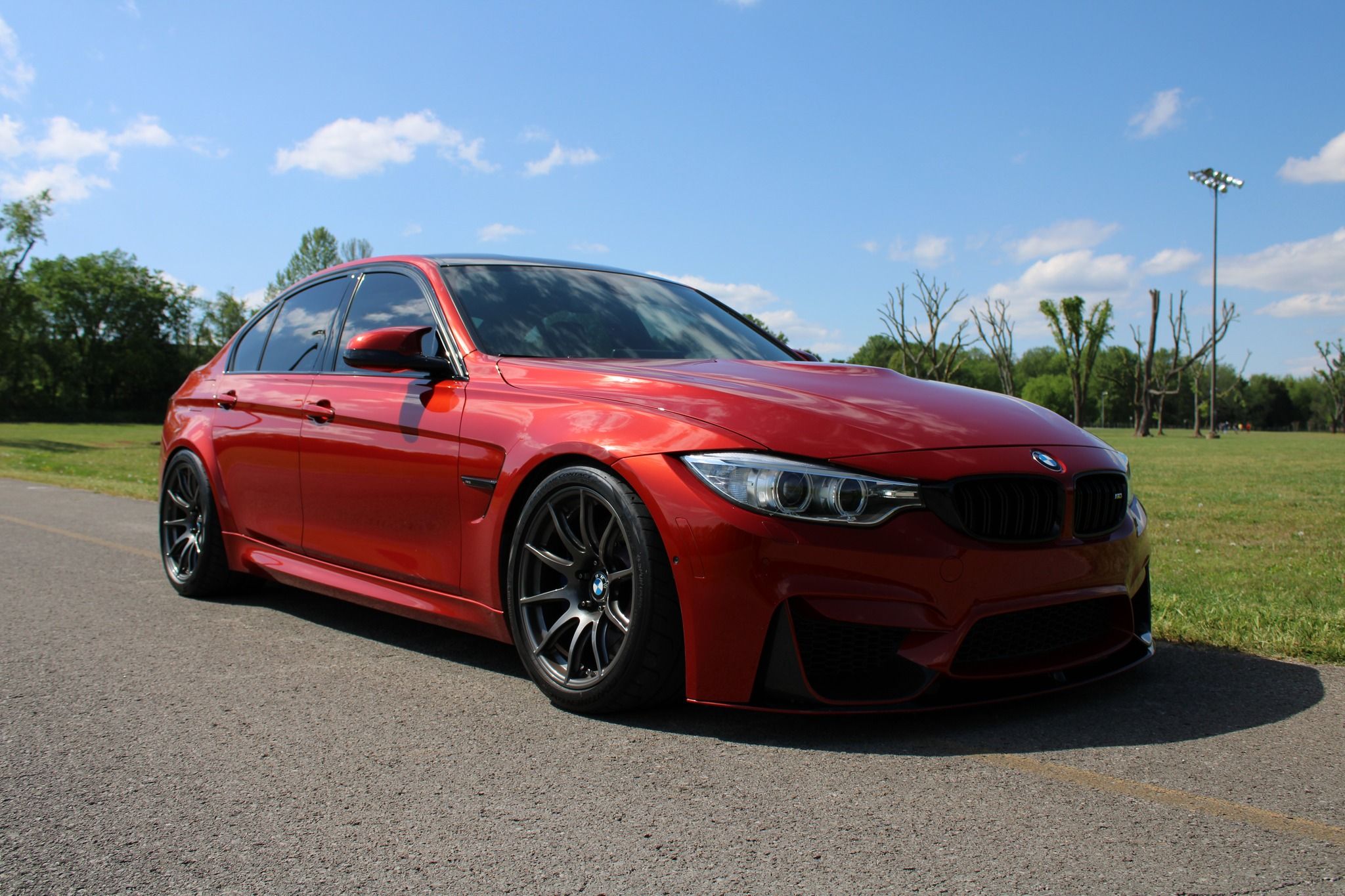 Orange BMW F80 M3 with 18" SM-10 Apex wheels in Anthracite