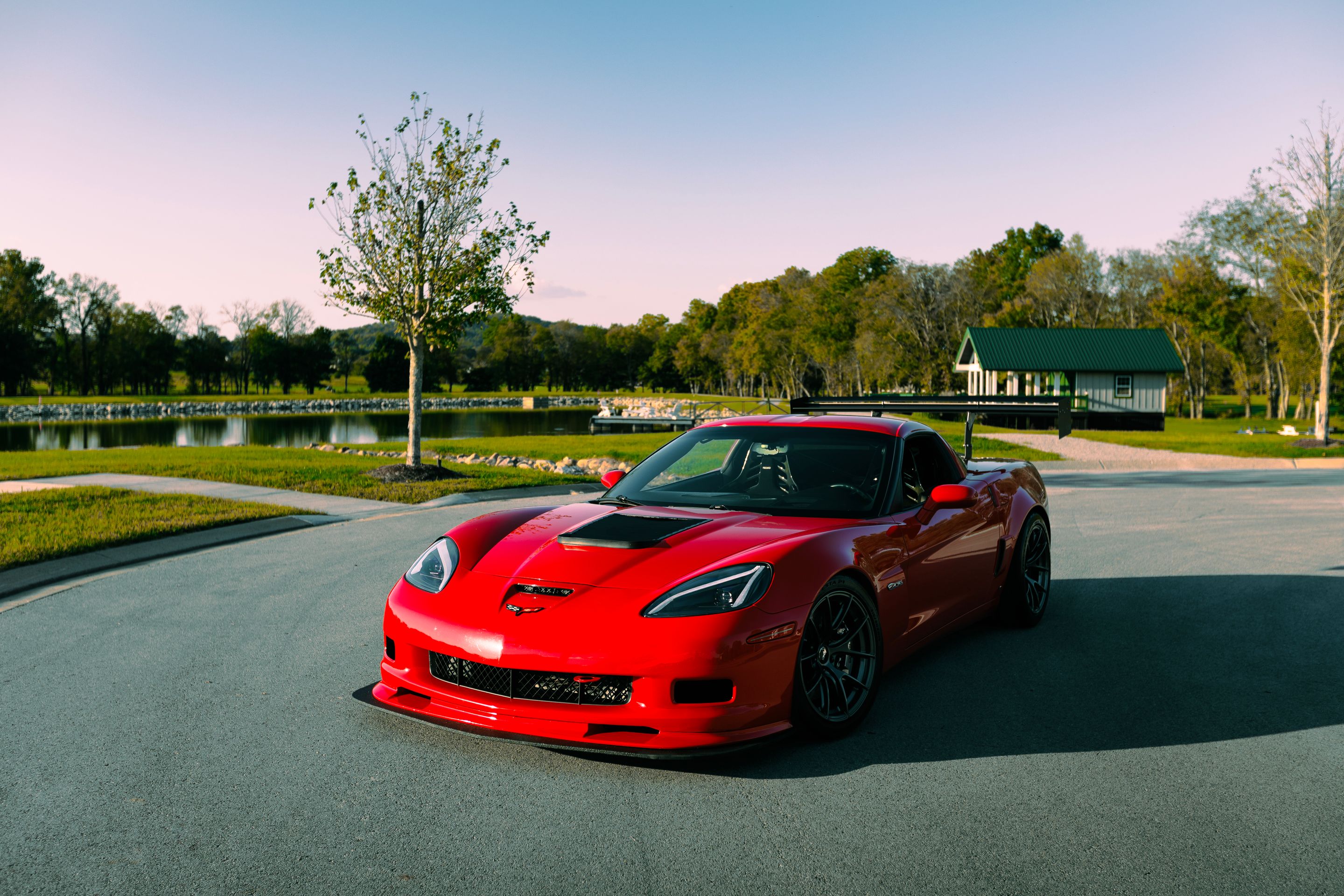 Red Chevrolet C6 Corvette Z06 with 18" VS-5RS Apex wheels in Anthracite