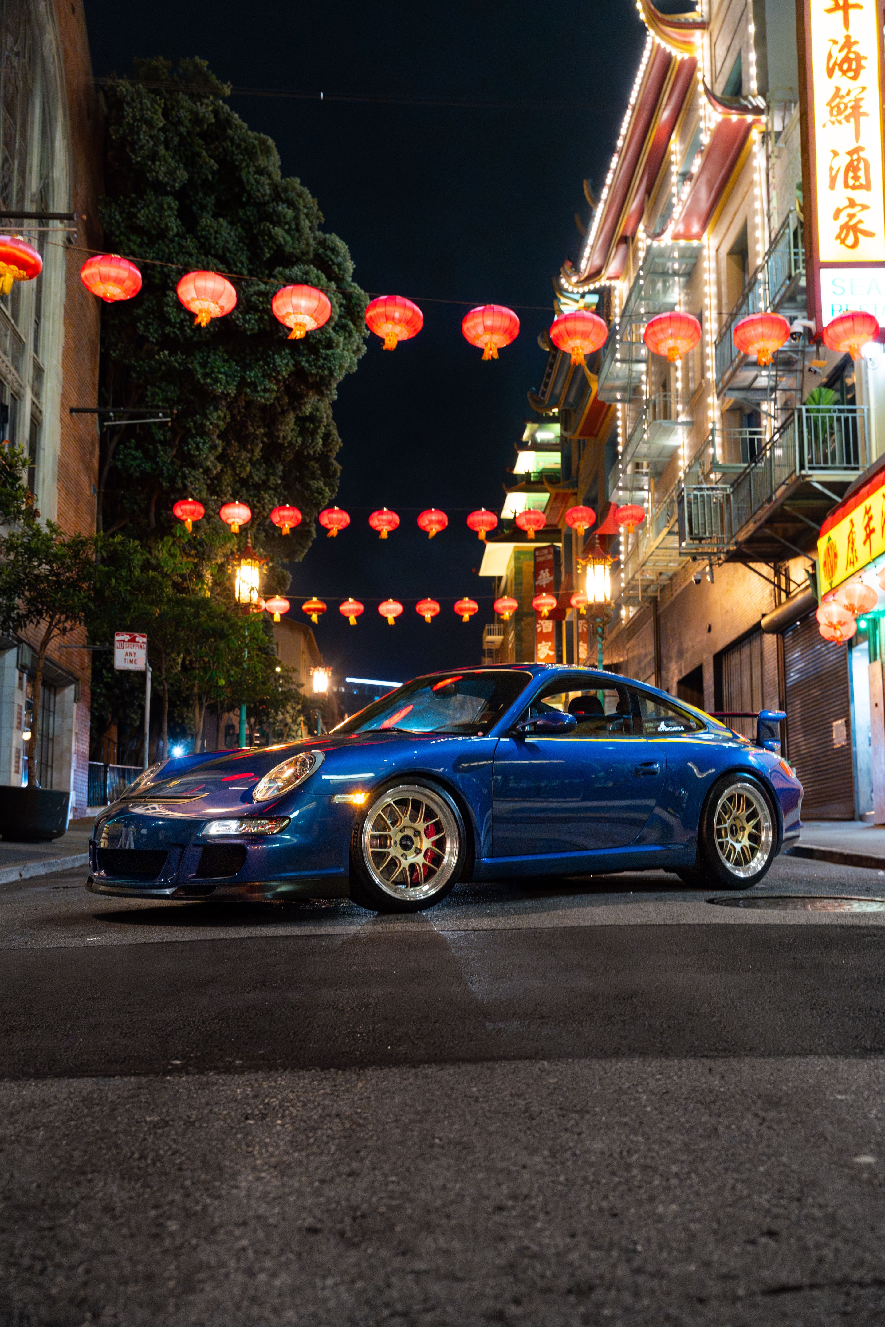 Blue Porsche 911 997 GT3 with 19" TEST-M Apex wheels in Machined Lip Gloss Motorsport Gold