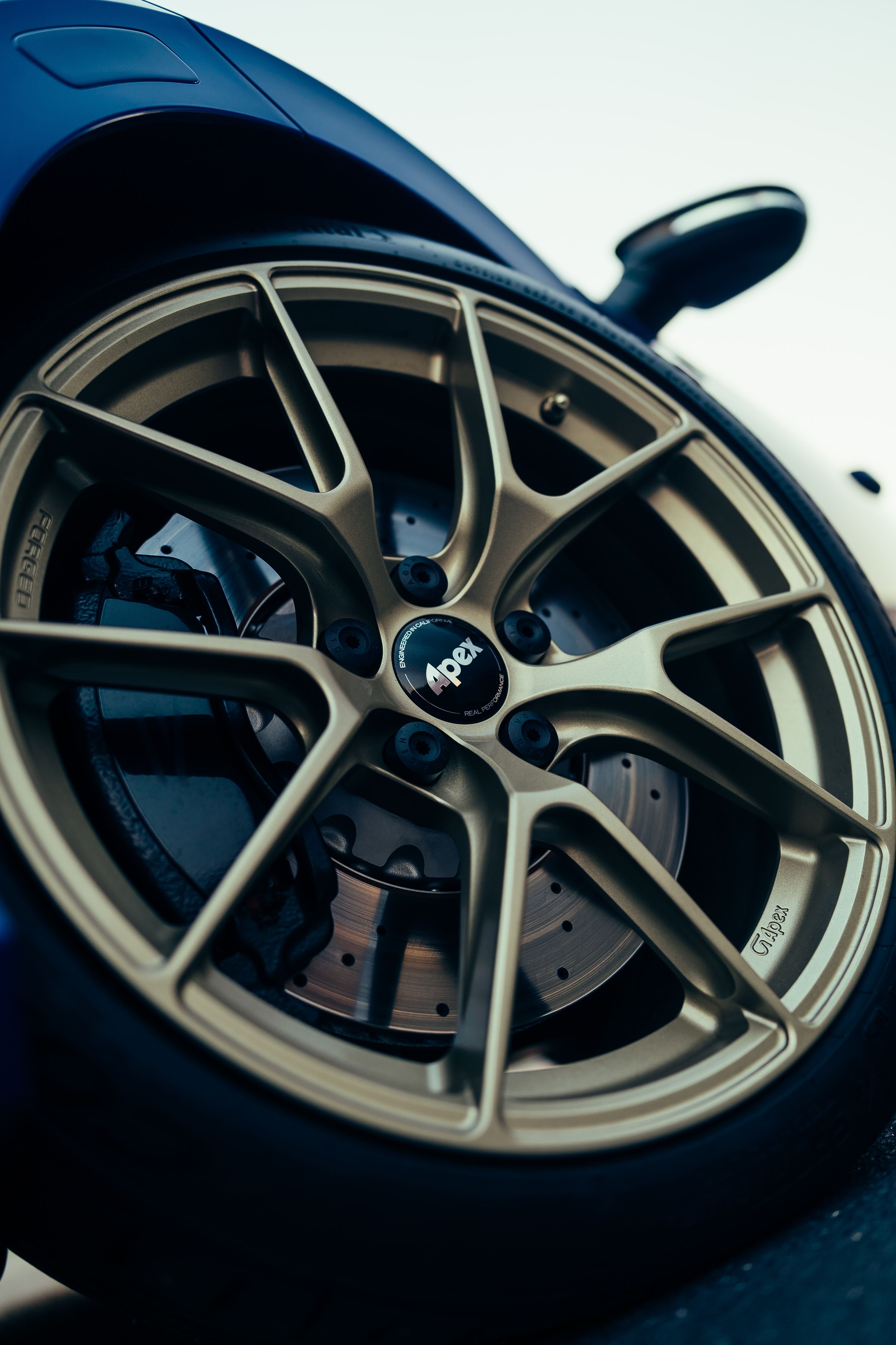 Blue VW MK8 Golf R with 18" VS-5RS Apex wheels in Motorsport Gold