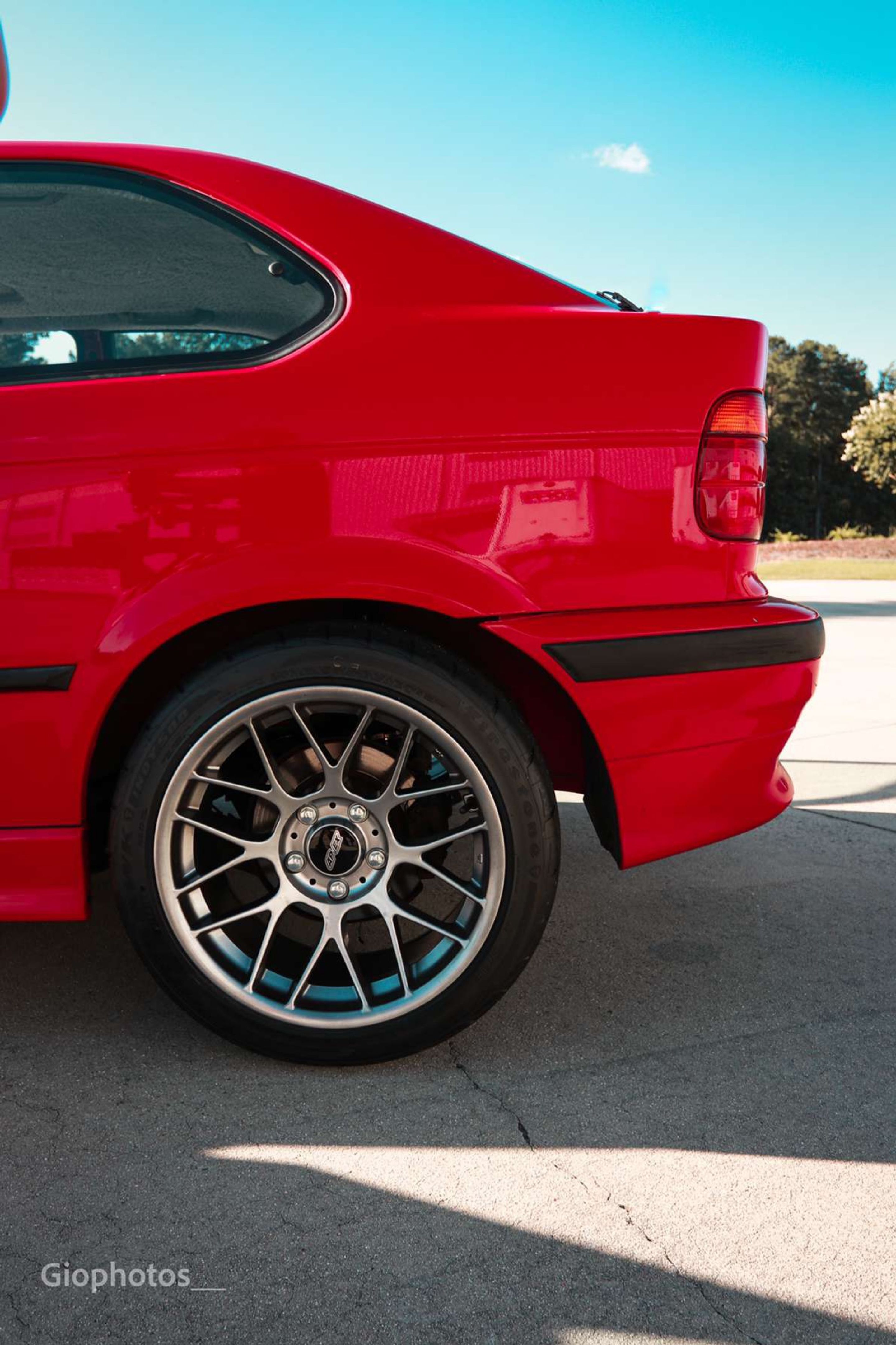 Red BMW E36 3 Series with 17" ARC-8 Apex wheels in Hyper Black