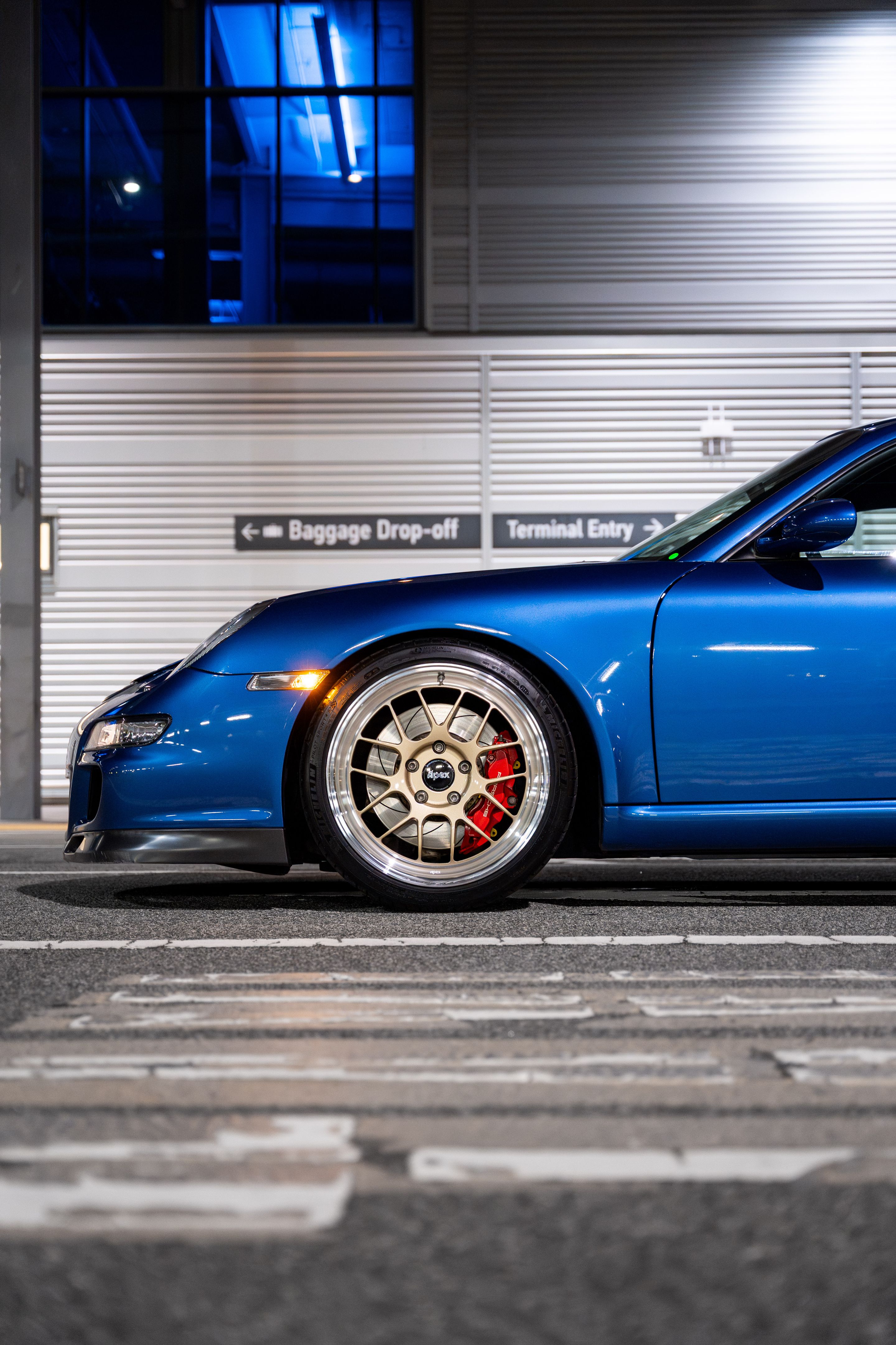 Blue Porsche 911 997 GT3 with 19" TEST-M Apex wheels in Machined Lip Gloss Motorsport Gold