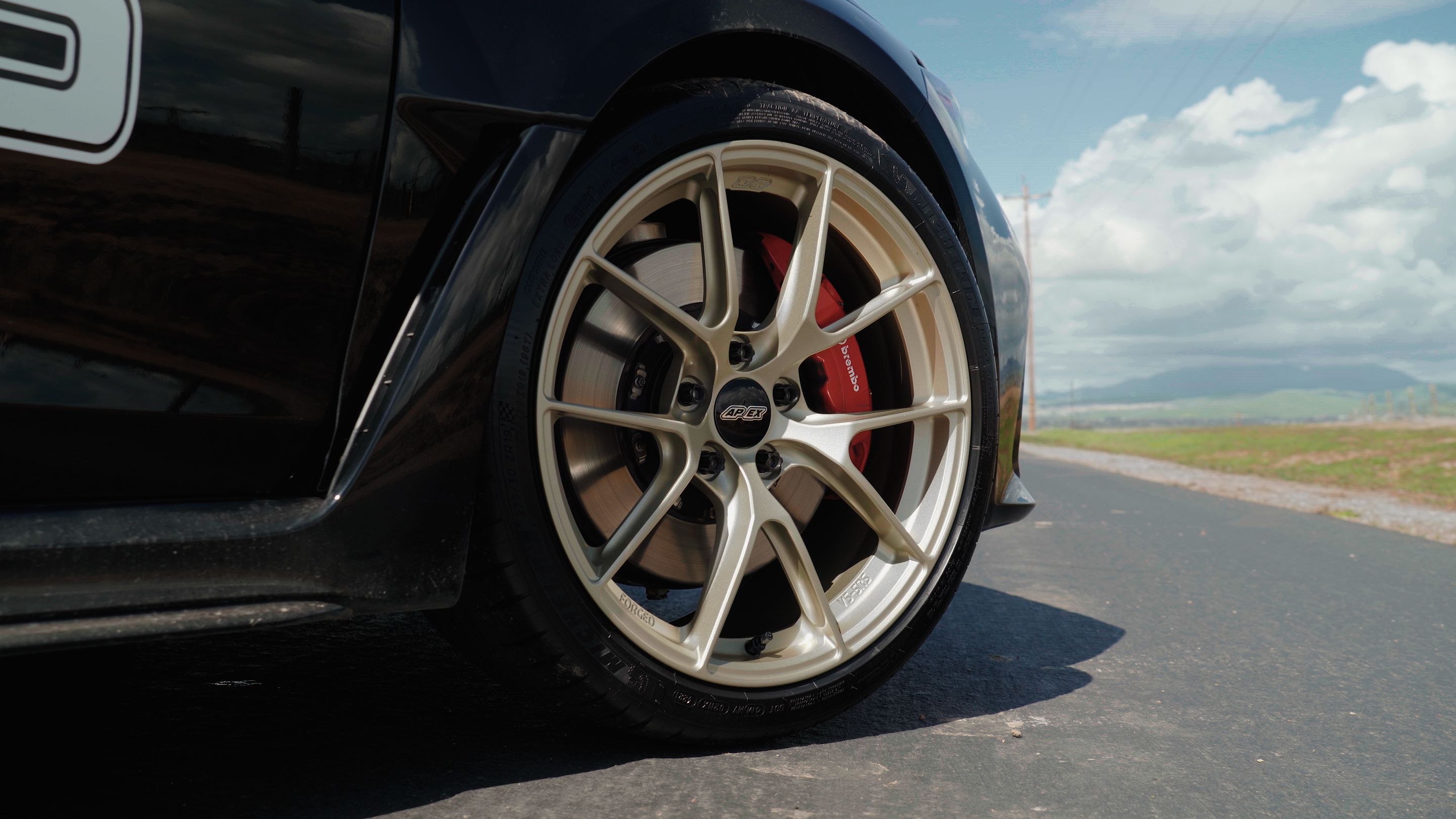 Black Honda FL5 Civic Type-R with 19" VS-5RS Apex wheels in Motorsport Gold