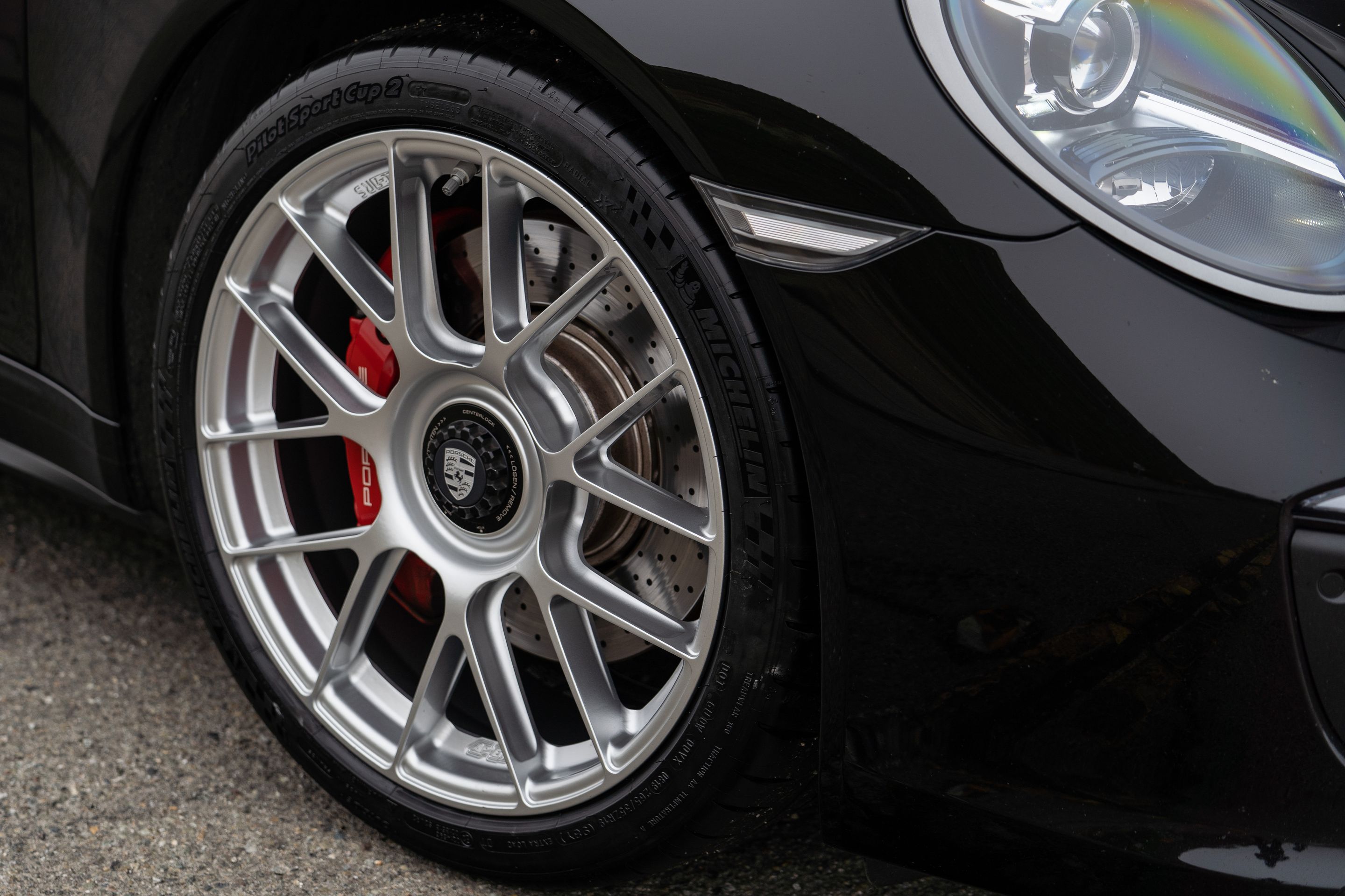 Black Porsche 911 991.2 Carrera GTS with 19" EC-7RS Apex wheels in Race Silver