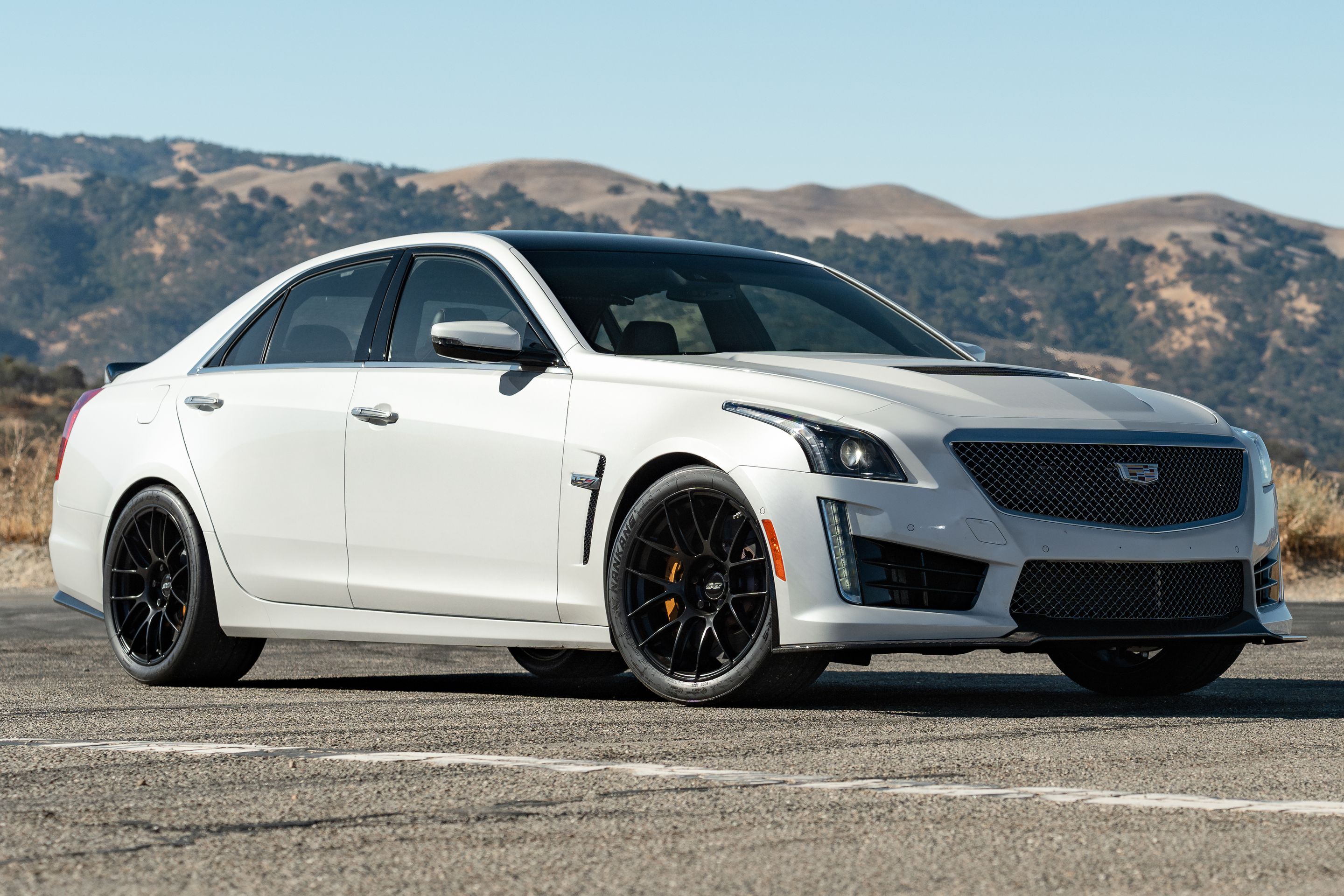 White Cadillac Gen 3 CTS-V with 19" EC-7RS Apex wheels in Satin Black
