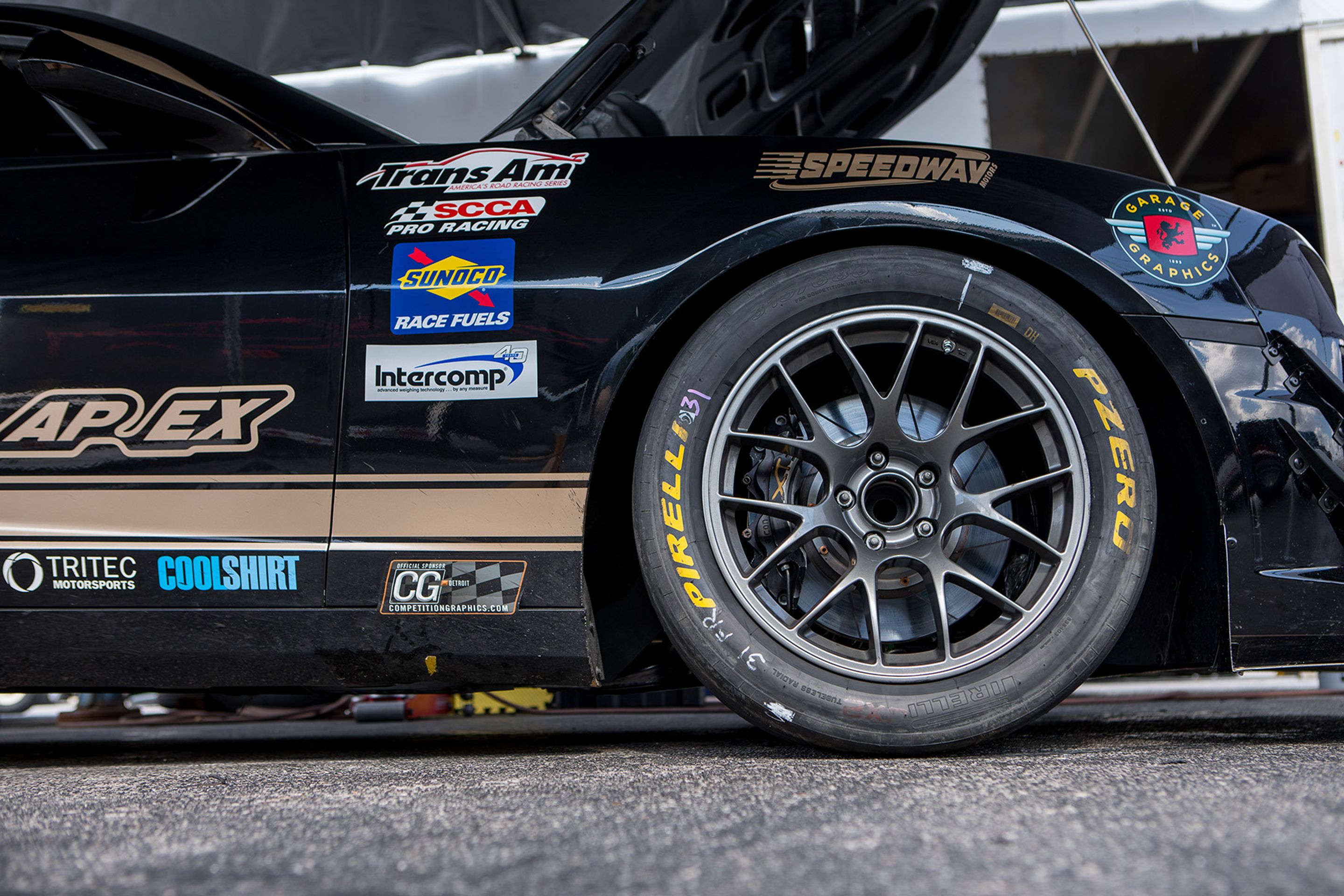 Black Chevrolet 5th Gen Camaro SS with 18" EC-7 Apex wheels in Anthracite