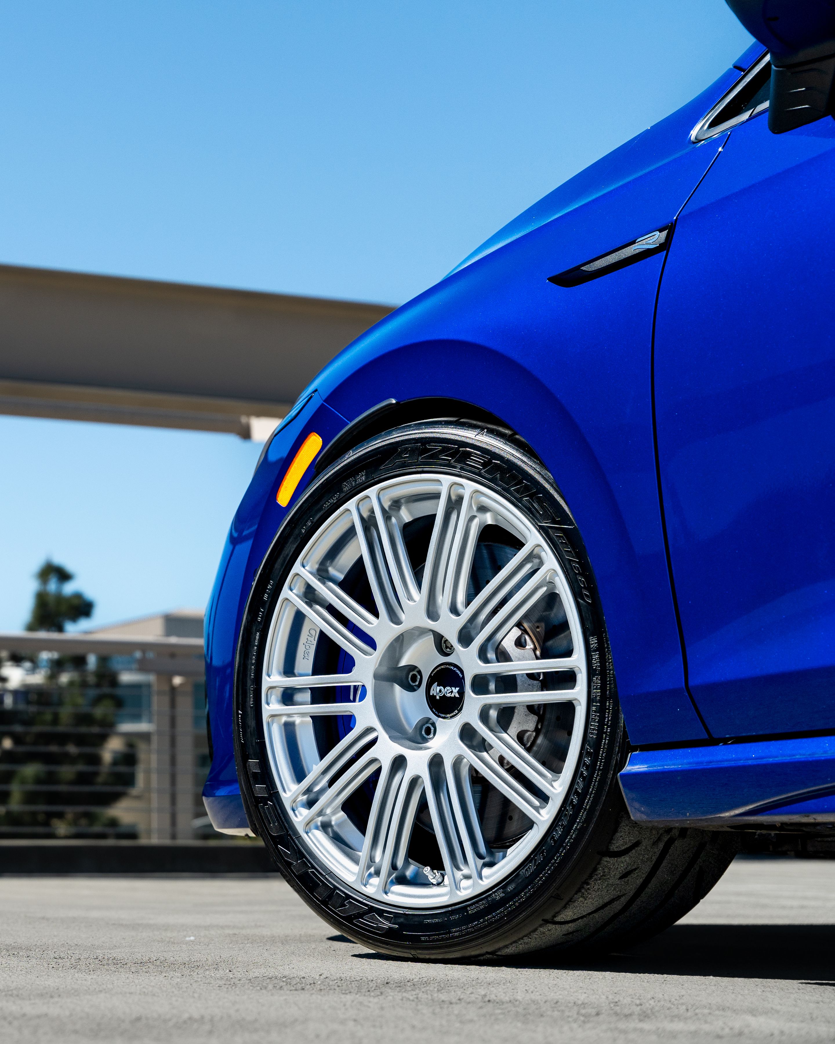 Blue VW MK8 Golf R with 18" TC-10RT Apex wheels in Race Silver