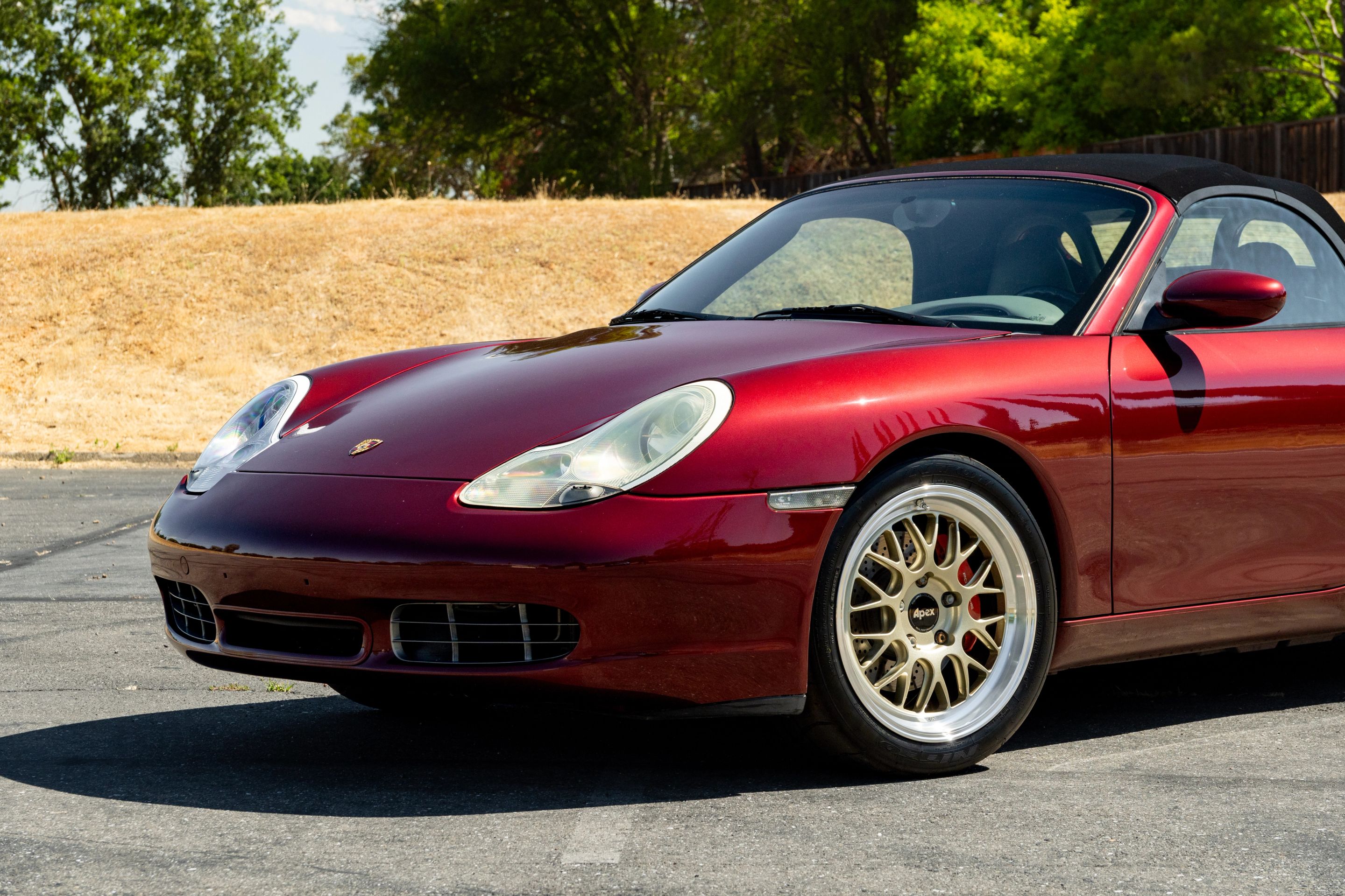 Red Porsche 986 Boxster with 18" ML-10RT Apex wheels in Machined Lip Gloss Motorsport Gold
