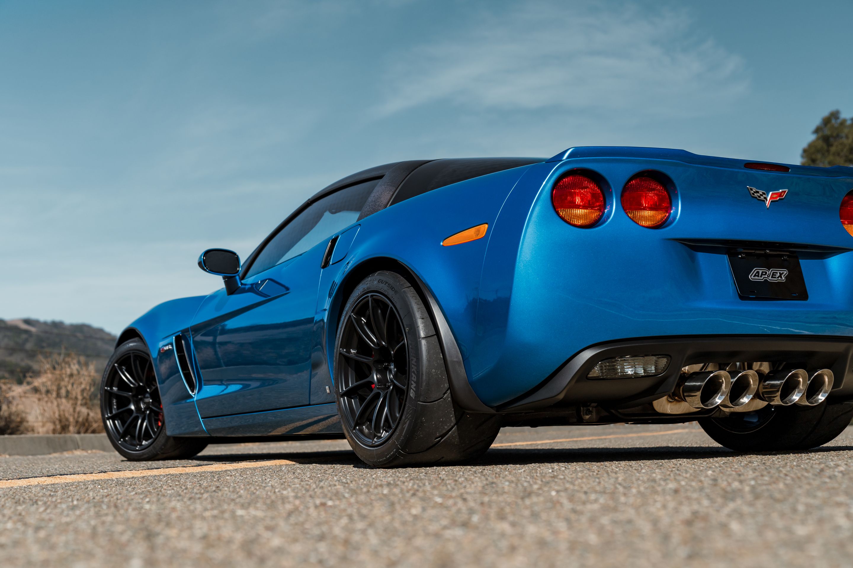 Blue Chevrolet C6 Corvette Z06 with 18" SM-10RS Apex wheels in Satin Black
