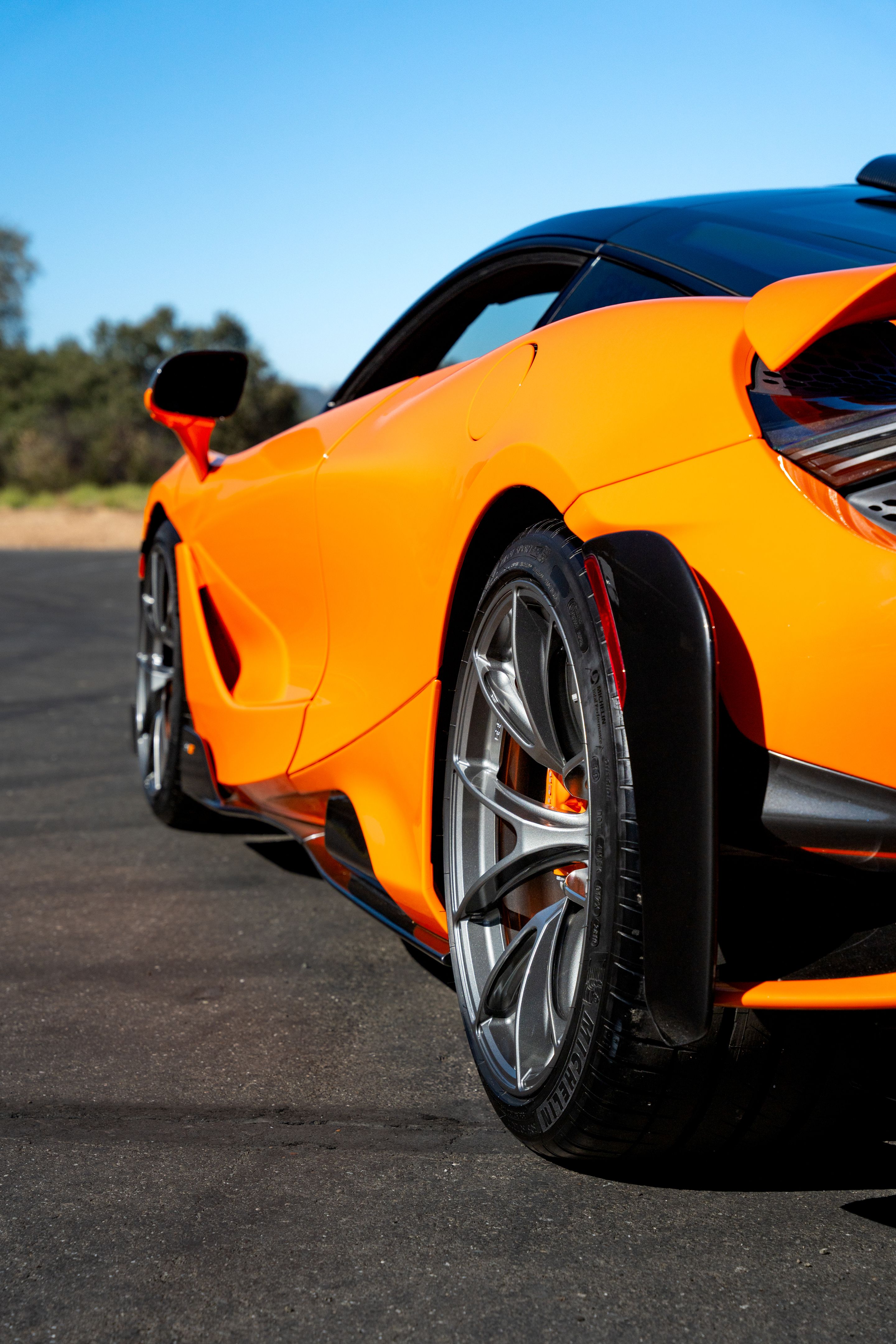 Orange McLaren 765LT with 19"/20" VS-5RS Apex wheels in Anthracite