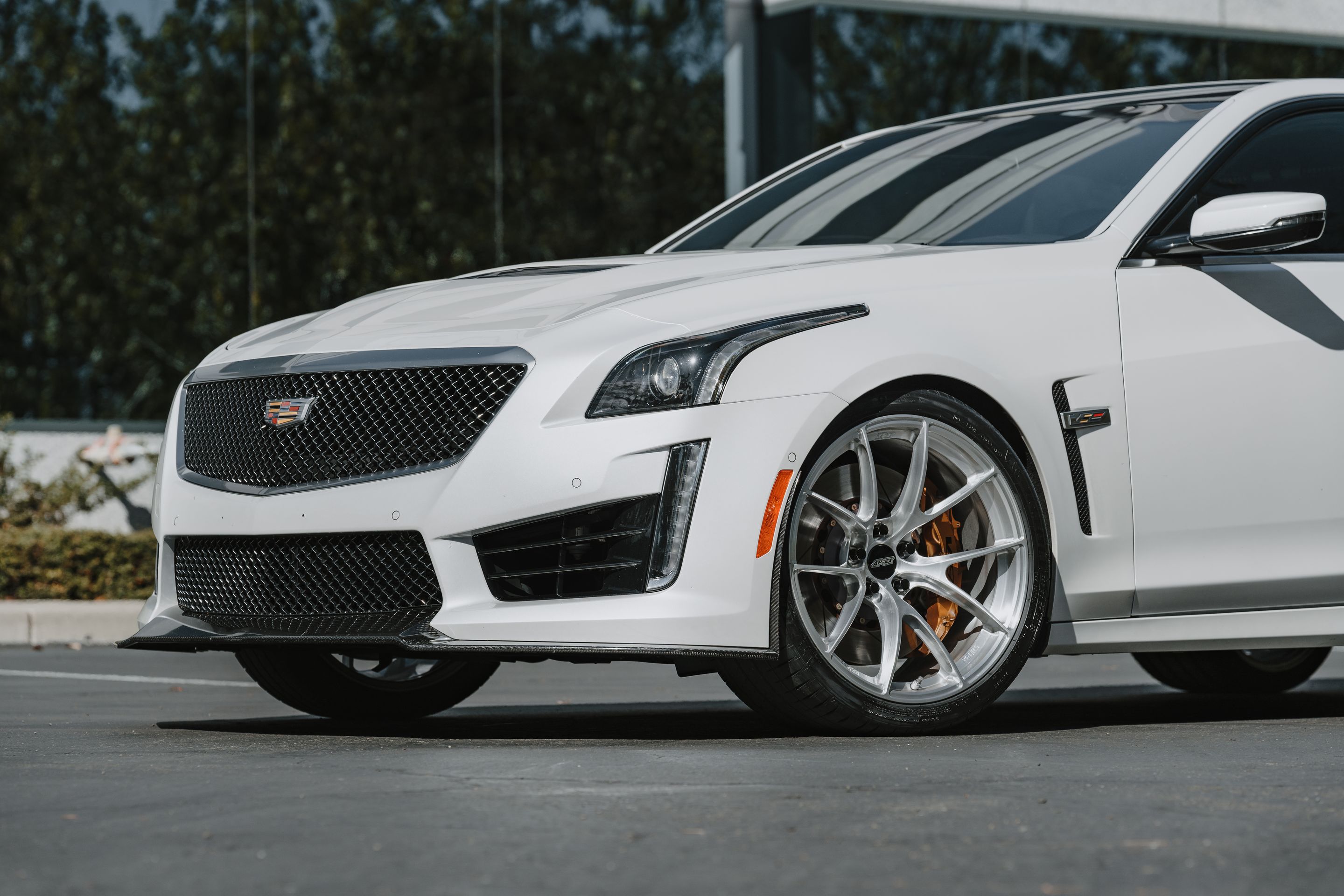 White Cadillac Gen 3 CTS-V with 20" VS-5RS Apex wheels in Brushed Clear