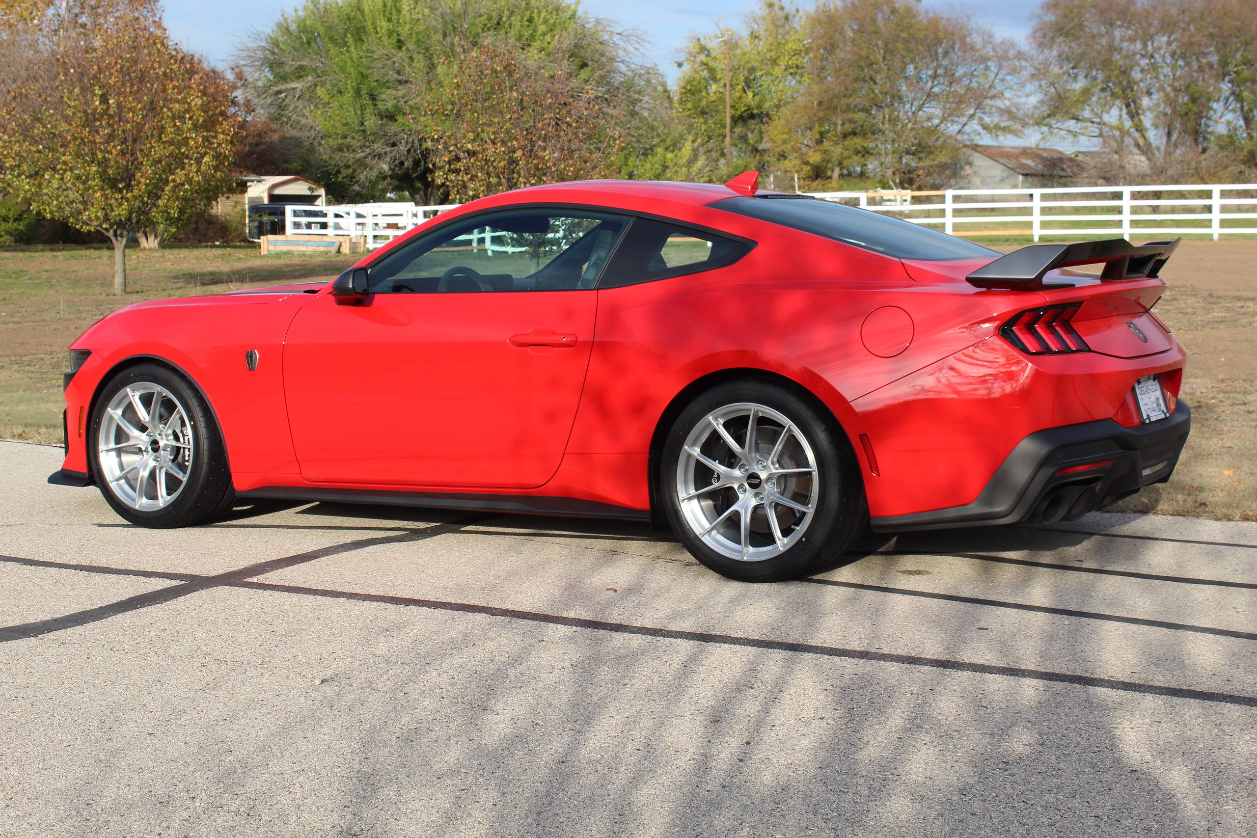 Red Ford S650 Mustang Dark Horse with 19" VS-5RS Apex wheels in Brushed Clear
