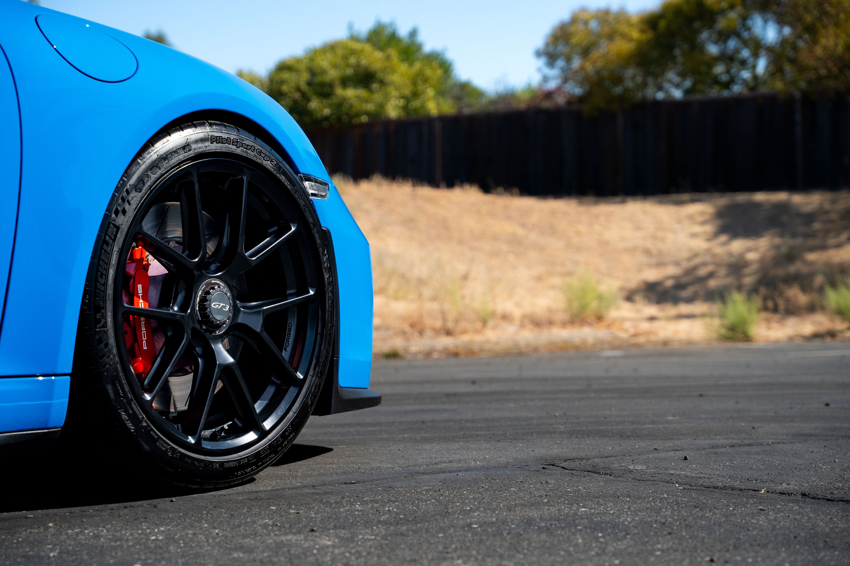 Blue Porsche 911 991.2 GT3 with 19" VS-5RE Apex wheels in Satin Black