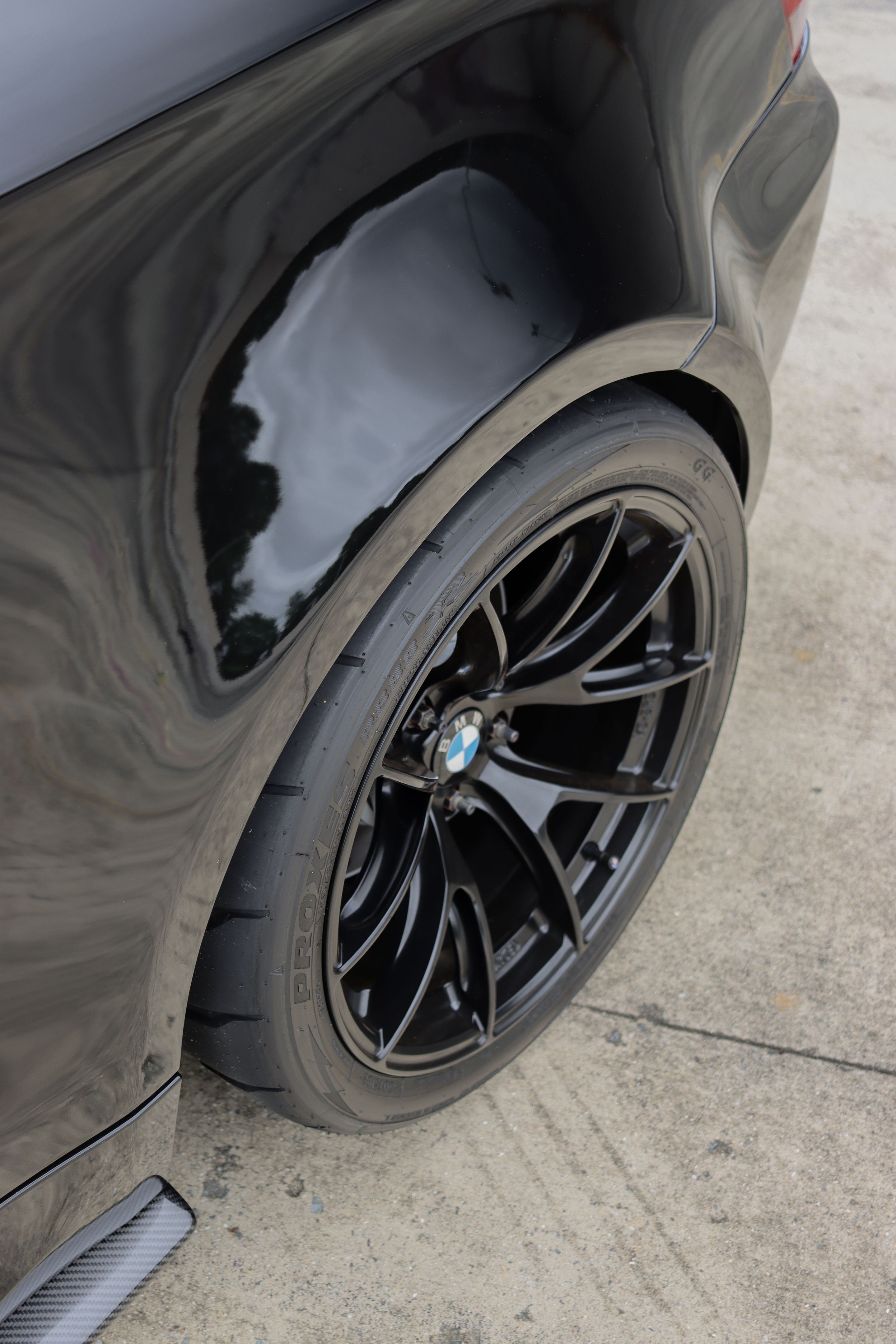 Black BMW E82 1M with 18" VS-5RS Apex wheels in Satin Black