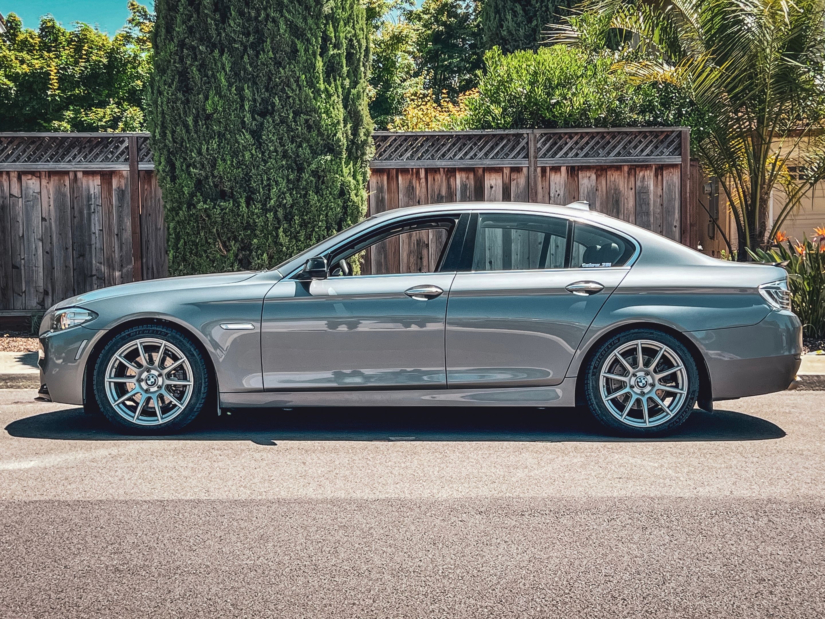Grey BMW F10 Sedan 5 Series with 19" SM-10 Apex wheels in Race Silver