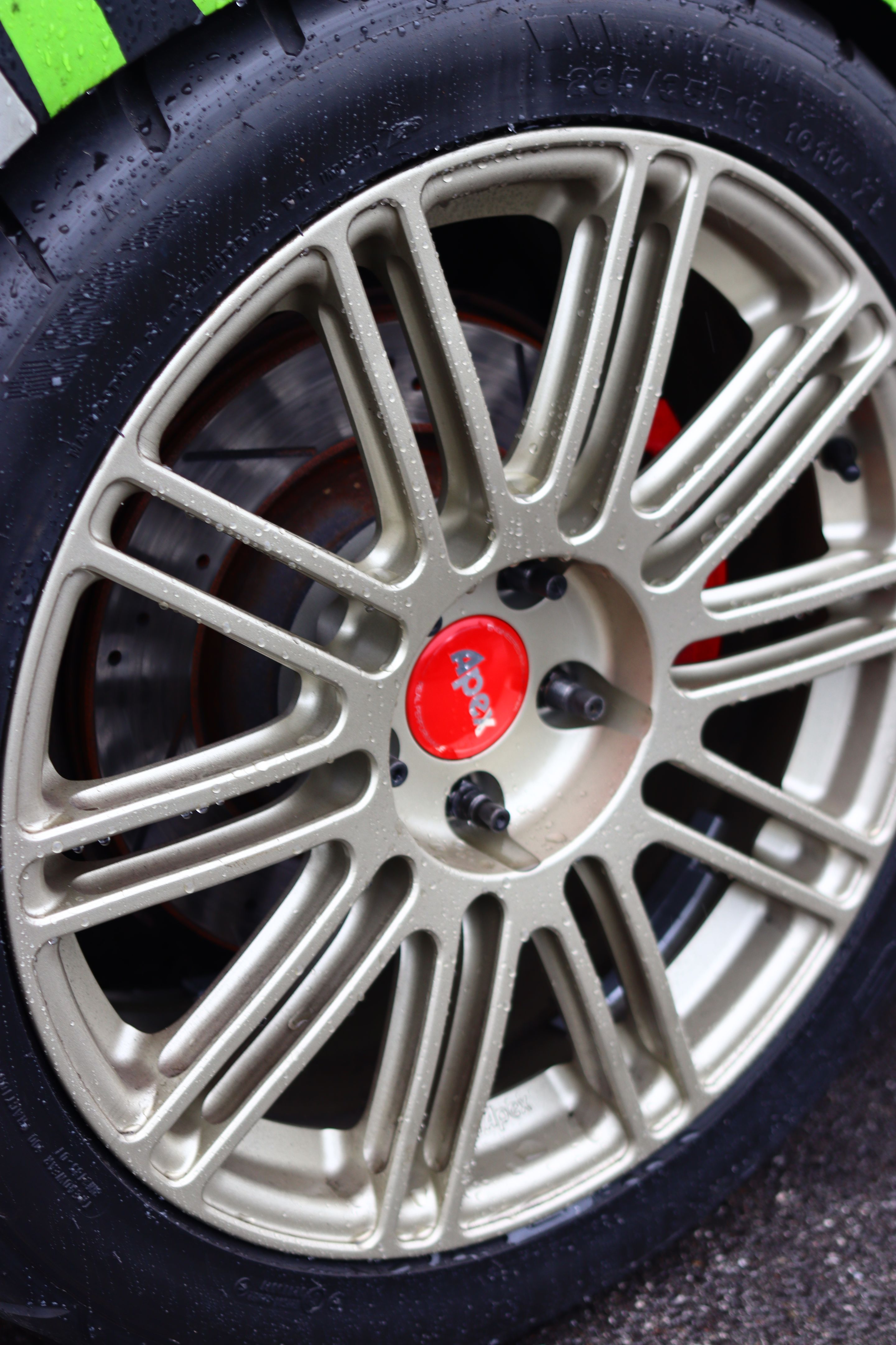 Race Livery VW MK7 GTI with 18" TC-10RT Apex wheels in Motorsport Gold