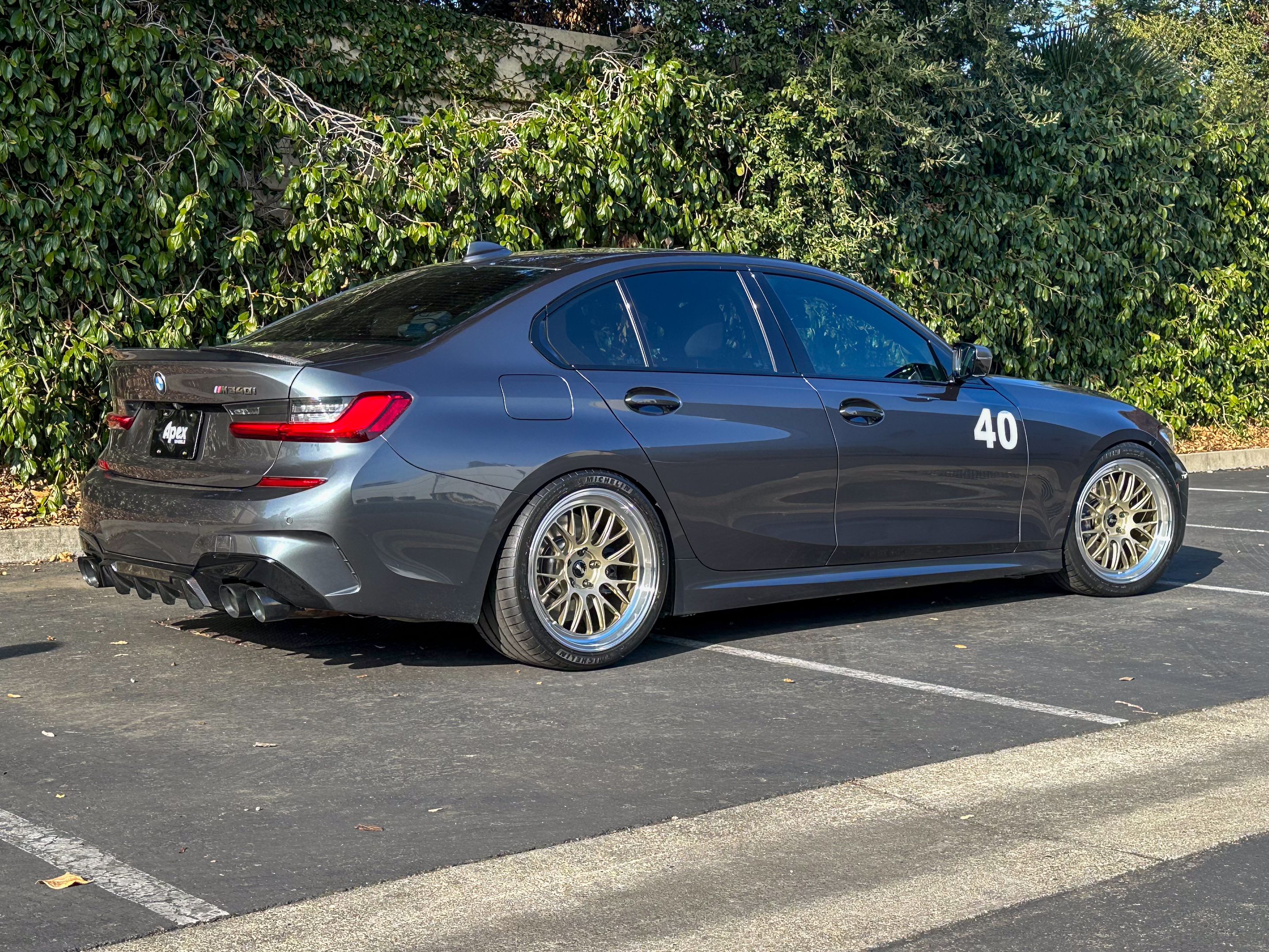 Grey BMW G20 Sedan 3 Series with 19" ML-10RT Apex wheels in Machined Lip Gloss Motorsport Gold