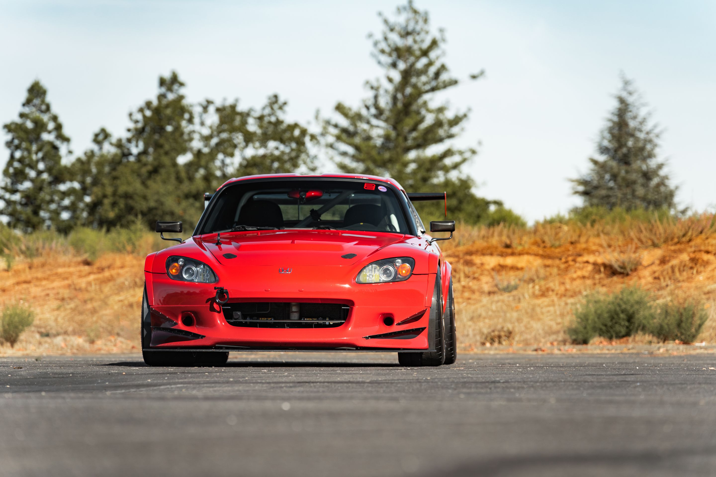 Red Honda S2000 with 17" VS-5RS Apex wheels in Satin Bronze