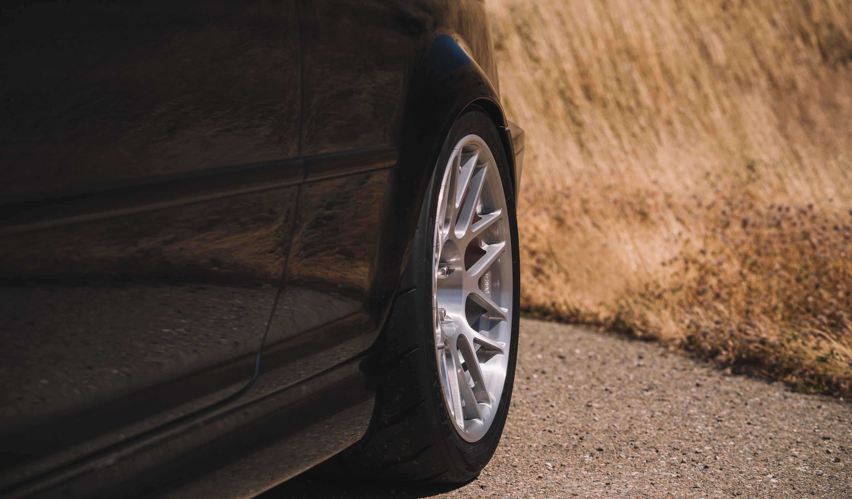 Black BMW E46 M3 with 18" ARC-8R Apex wheels in Brushed Clear