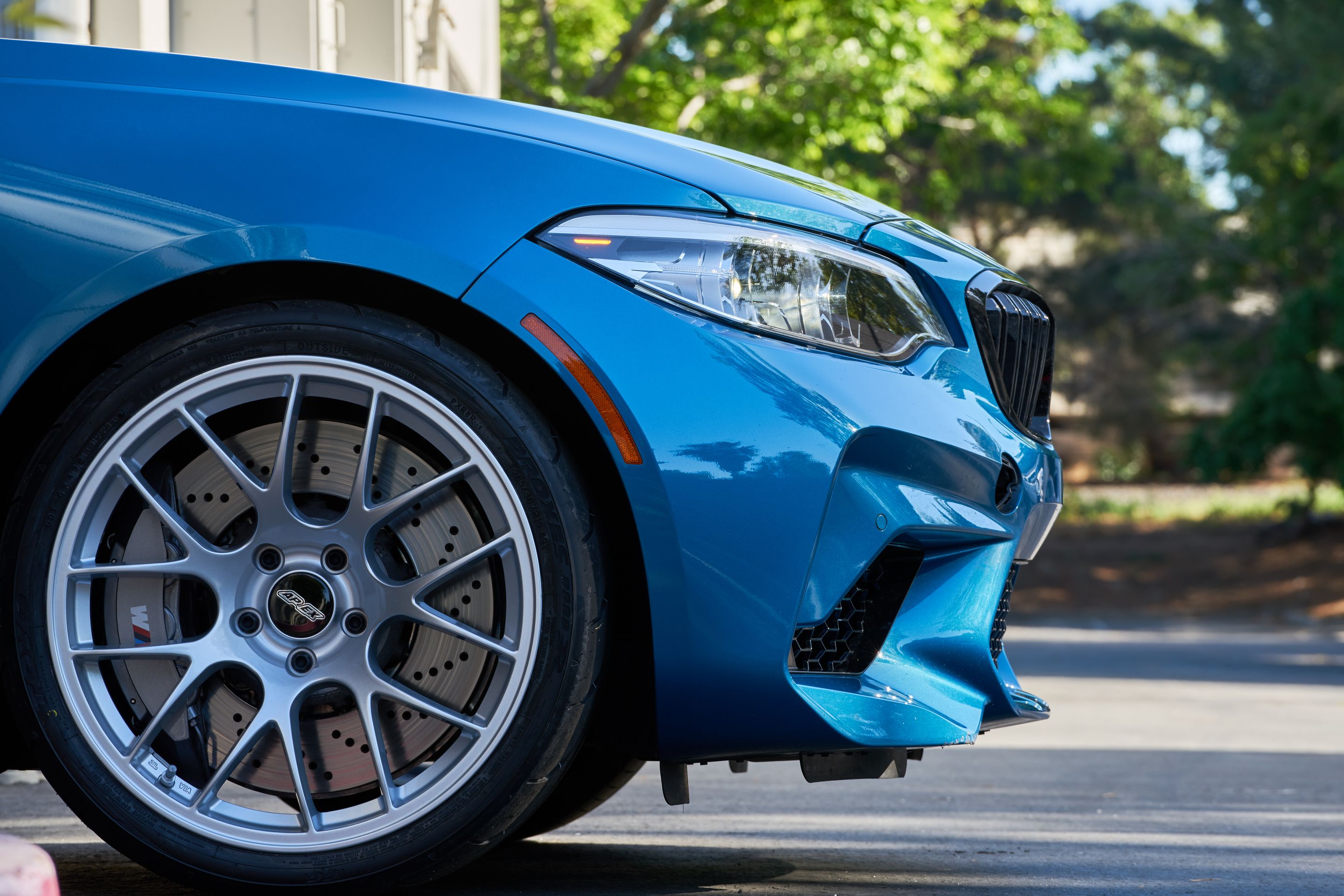 Blue BMW F87 M2 with 19" EC-7 Apex wheels in Race Silver