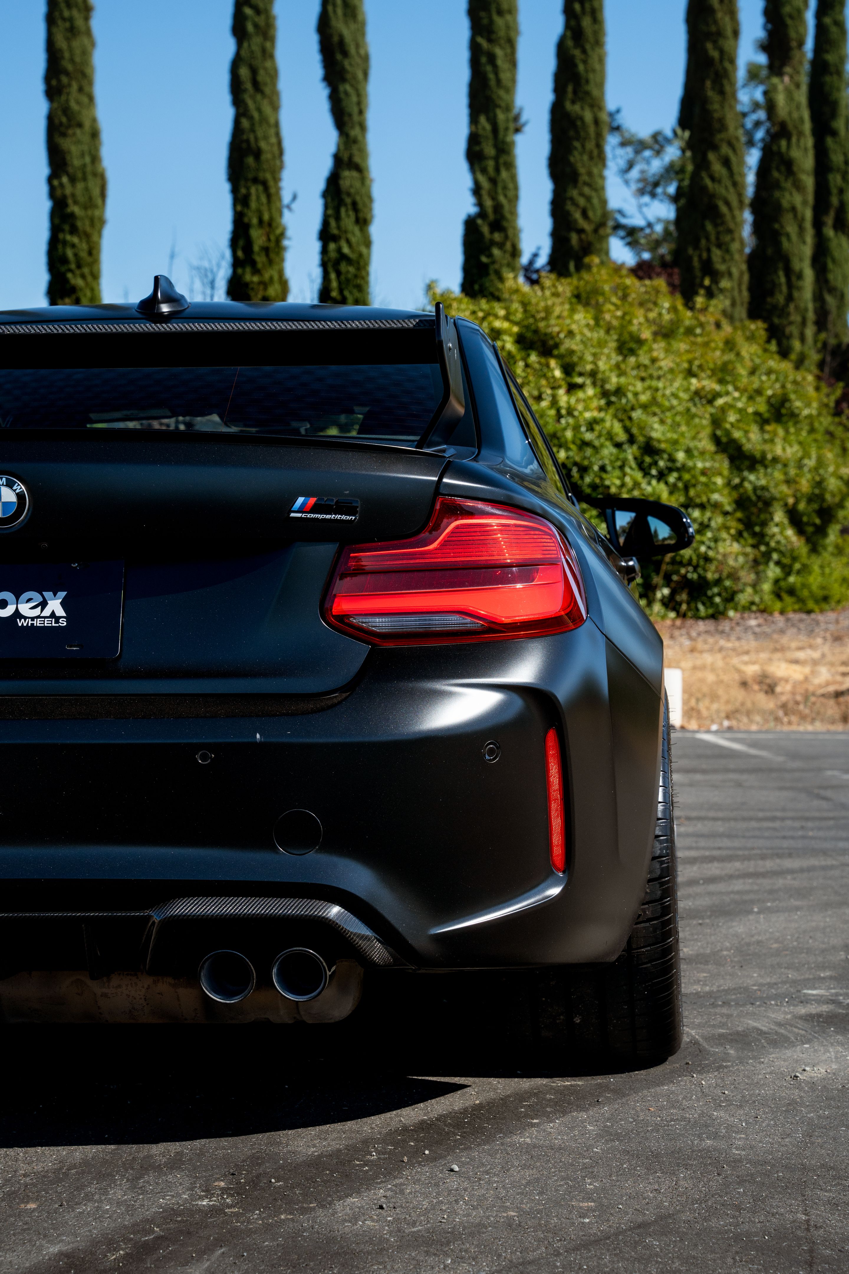 Black BMW F87 M2 with 19" ML-10RT Apex wheels in Machined Lip Race Silver