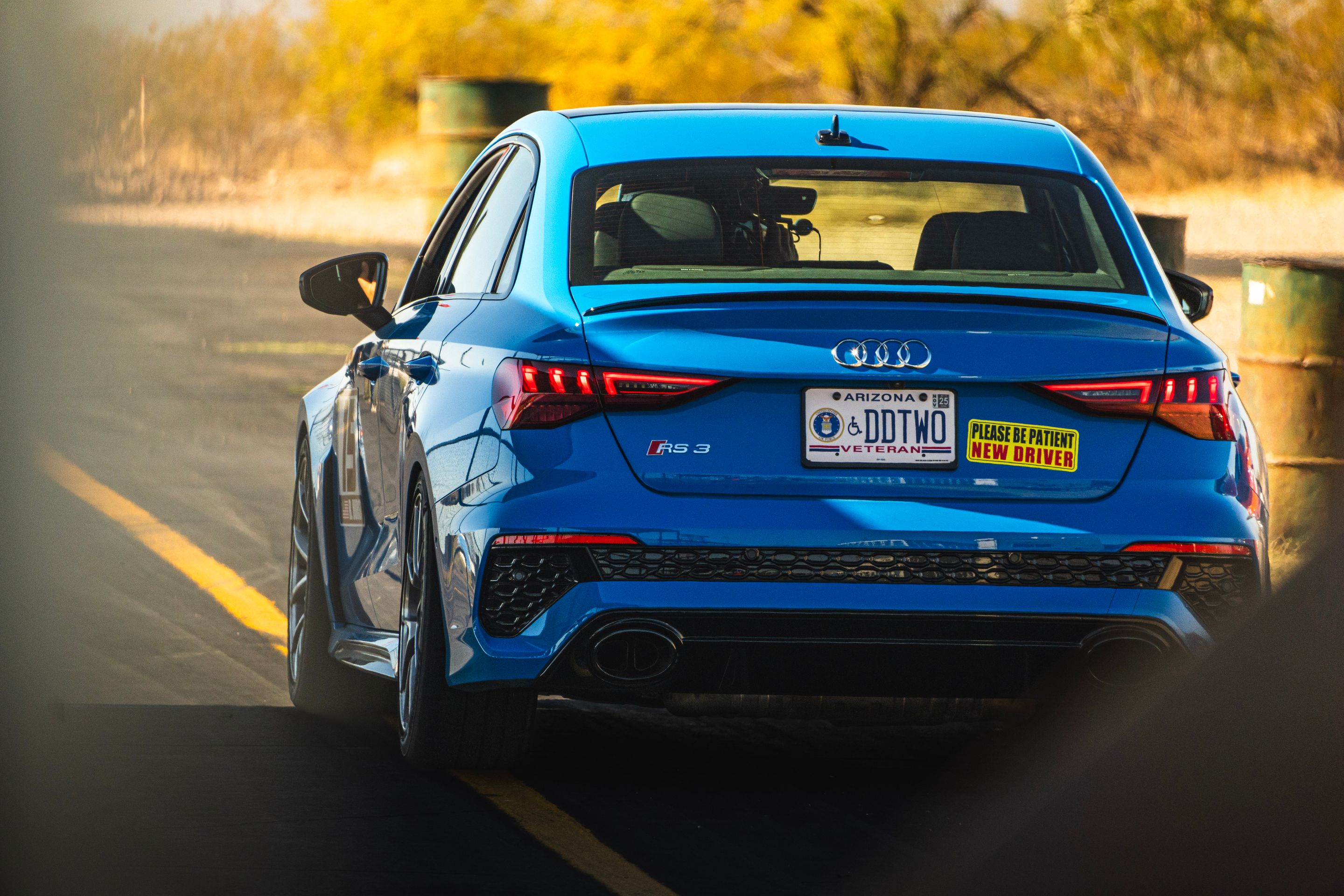 Blue Audi 8Y RS 3 with 18" VS-5RS Apex wheels in Brushed Clear