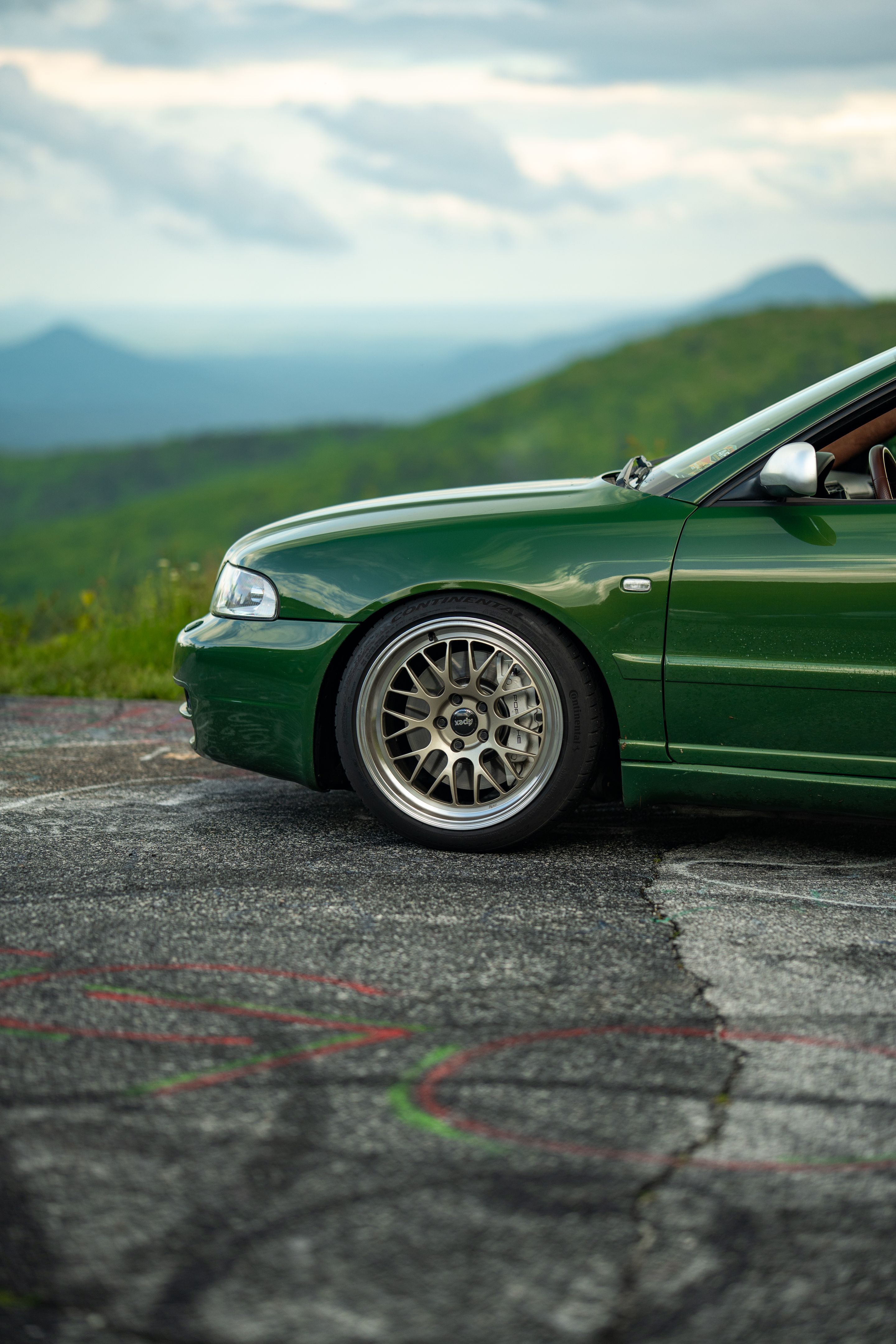 Green Audi B5 S4 Avant/Wagon with 18" ML-10RT Apex wheels in Machined Lip Gloss Motorsport Gold
