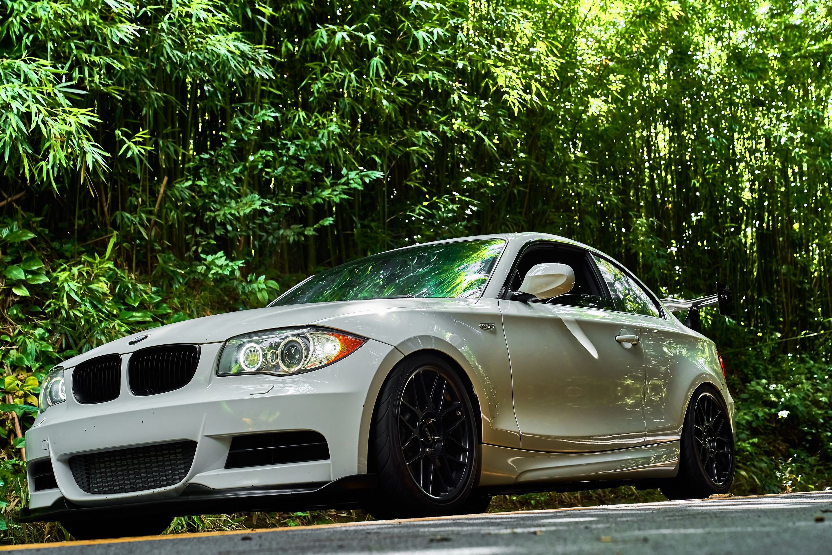 White BMW E82 Coupe 1 Series with 18" ARC-8 Apex wheels in Satin Black