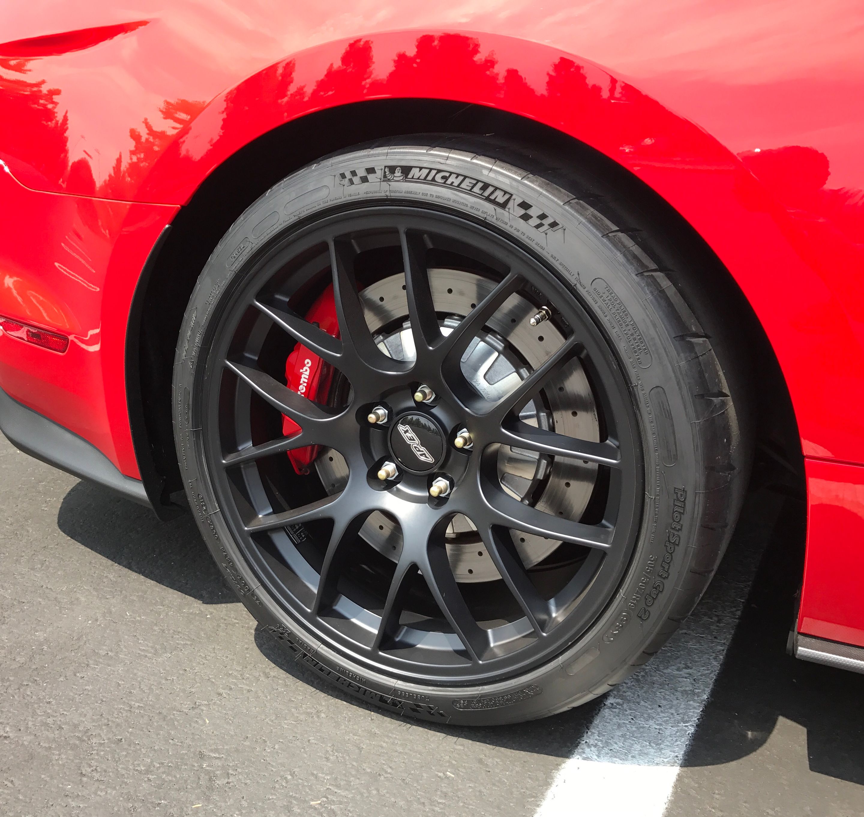 Red Ford S550 Mustang GT350 with 19" EC-7 Apex wheels in Satin Black