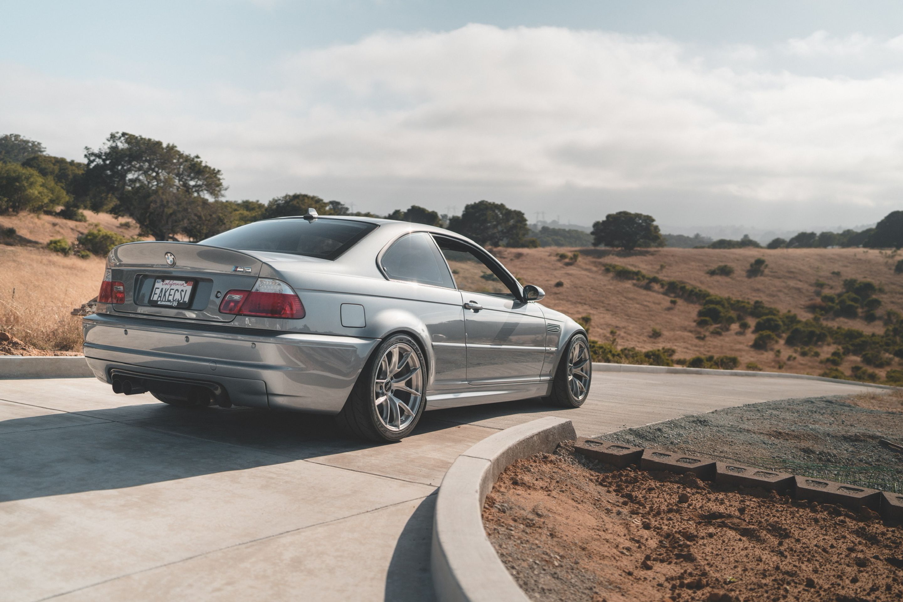 Silver BMW E46 M3 with 18" VS-5RS Apex wheels in Brushed Clear