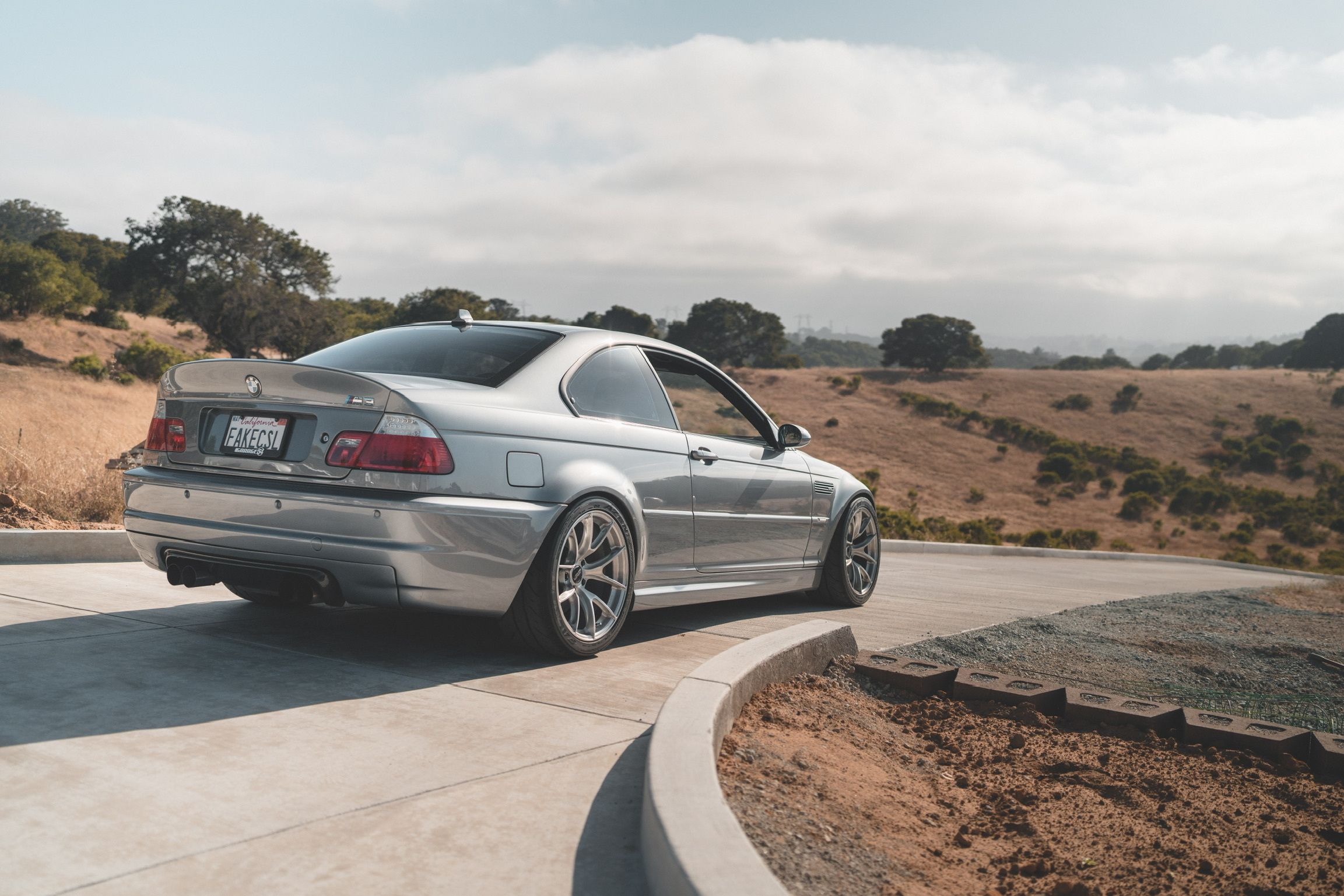 Silver BMW E46 M3 with 18" VS-5RS Apex wheels in Brushed Clear