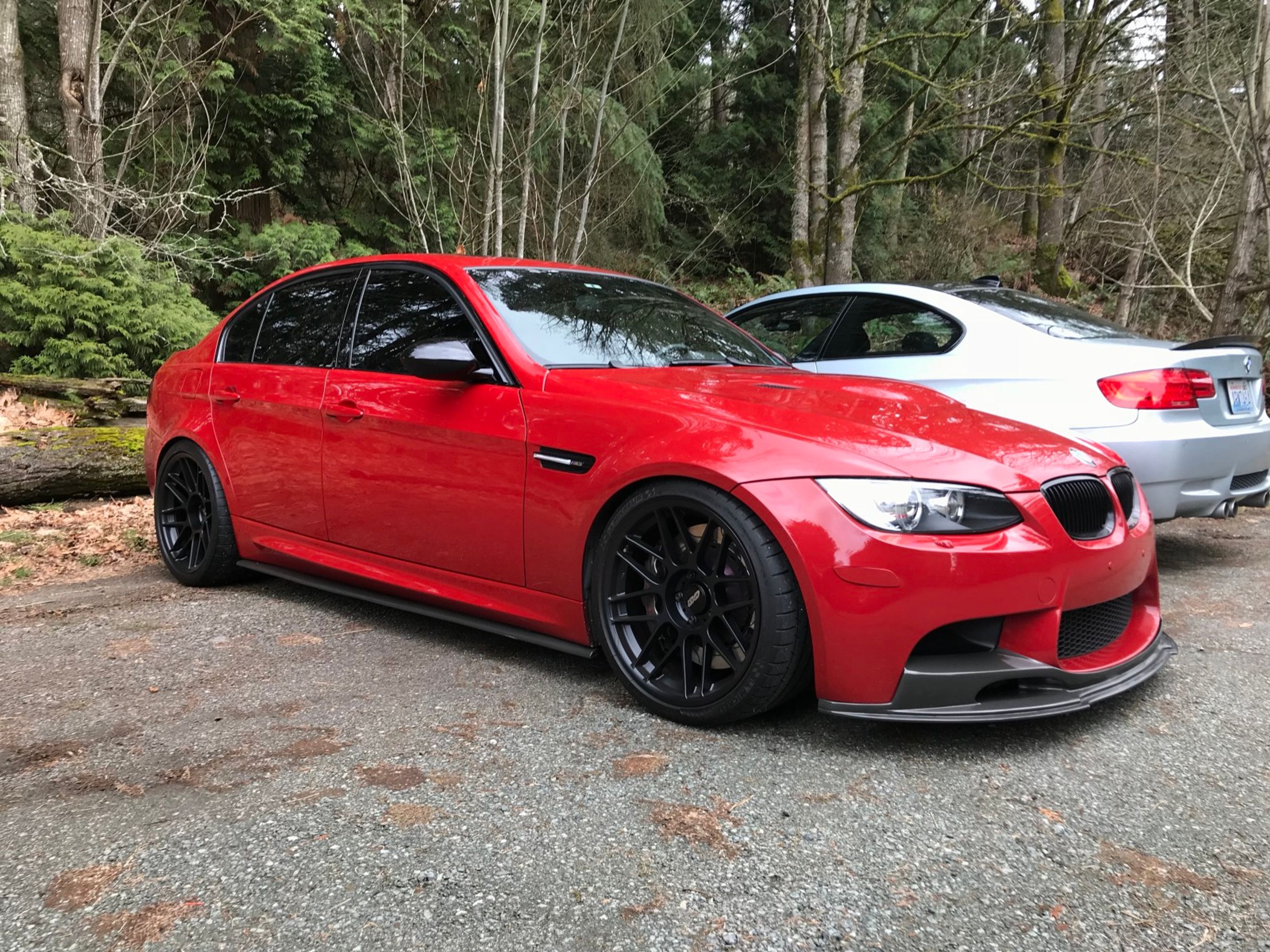 Red BMW E90 Sedan M3 with 19" ARC-8 Apex wheels in Satin Black