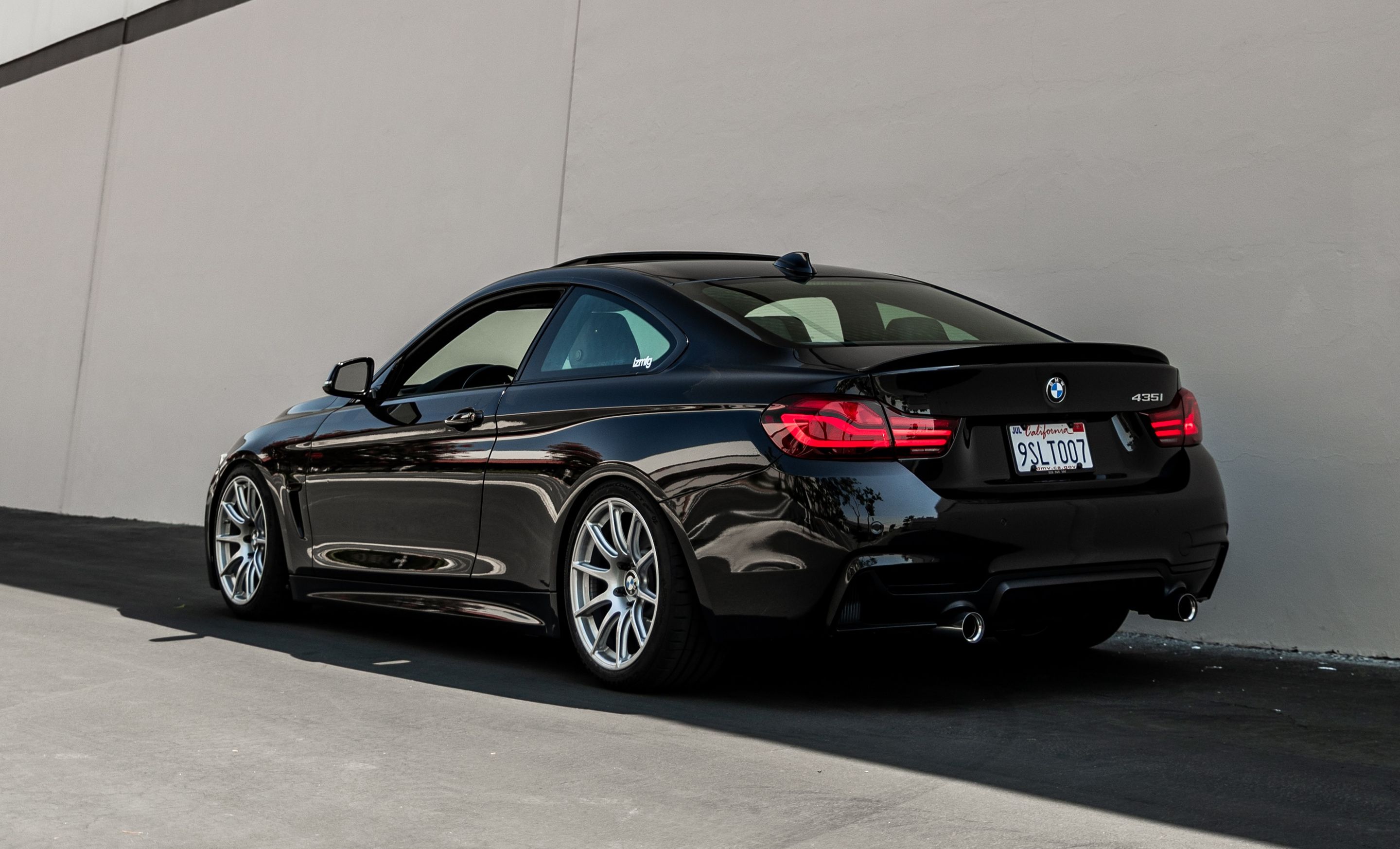 Black BMW F32 Coupe 4 Series with 18" SM-10 Apex wheels in Race Silver