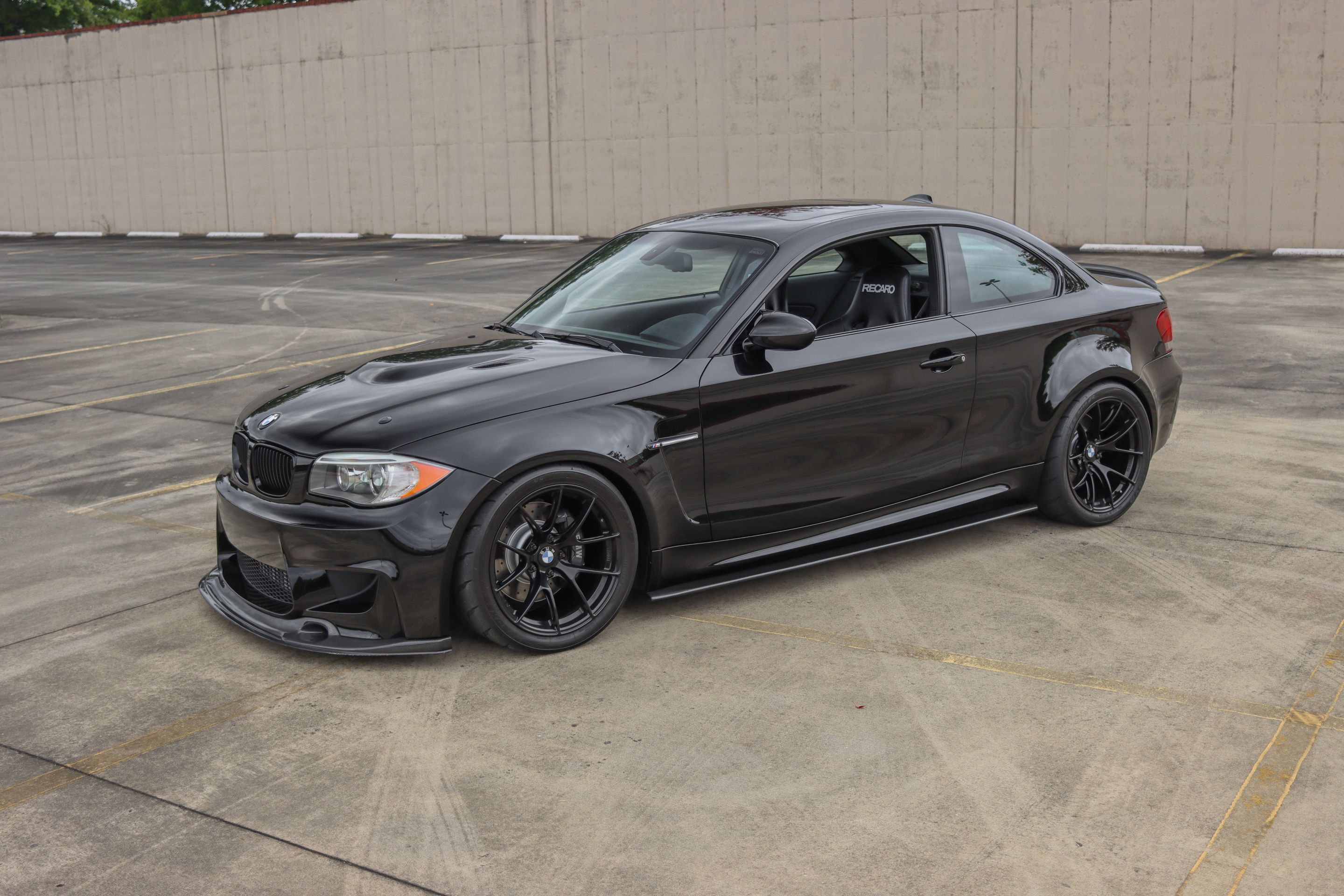 Black BMW E82 1M with 18" VS-5RS Apex wheels in Satin Black
