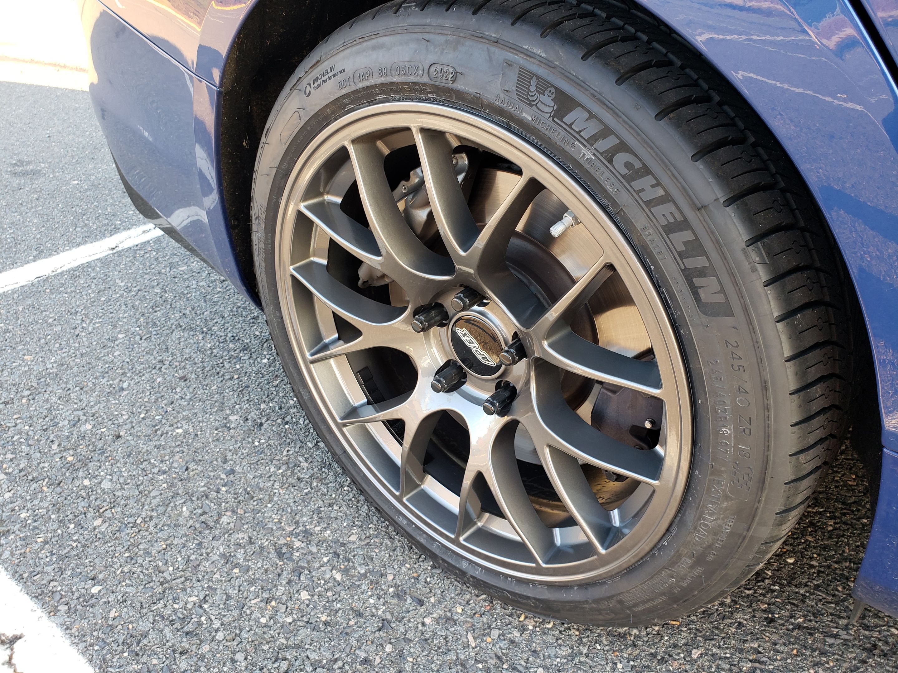 Blue Cadillac CT4-V Blackwing with 18" EC-7 Apex wheels in Anthracite