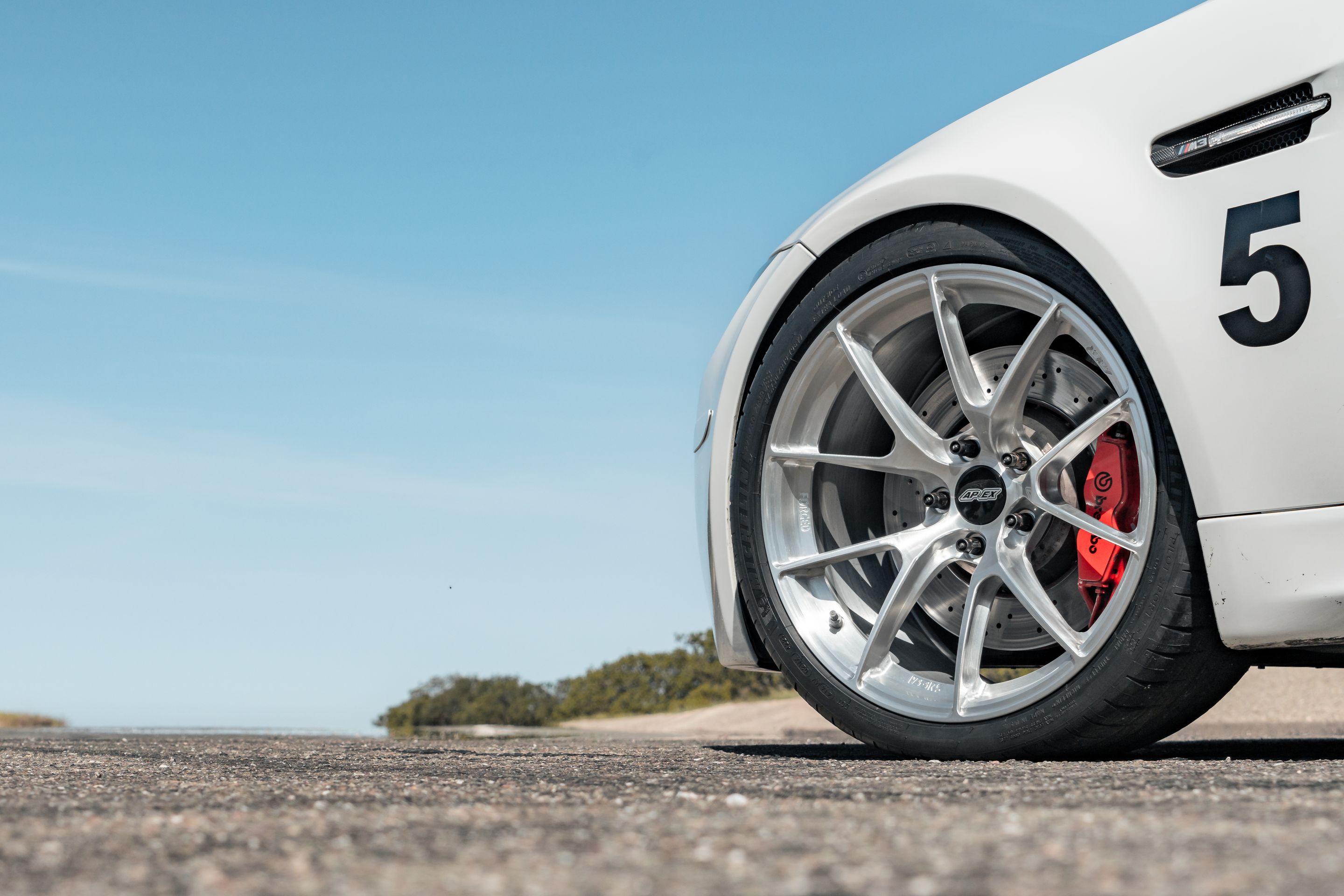 White BMW E90 Sedan M3 with 19" VS-5RS Apex wheels in Brushed Clear