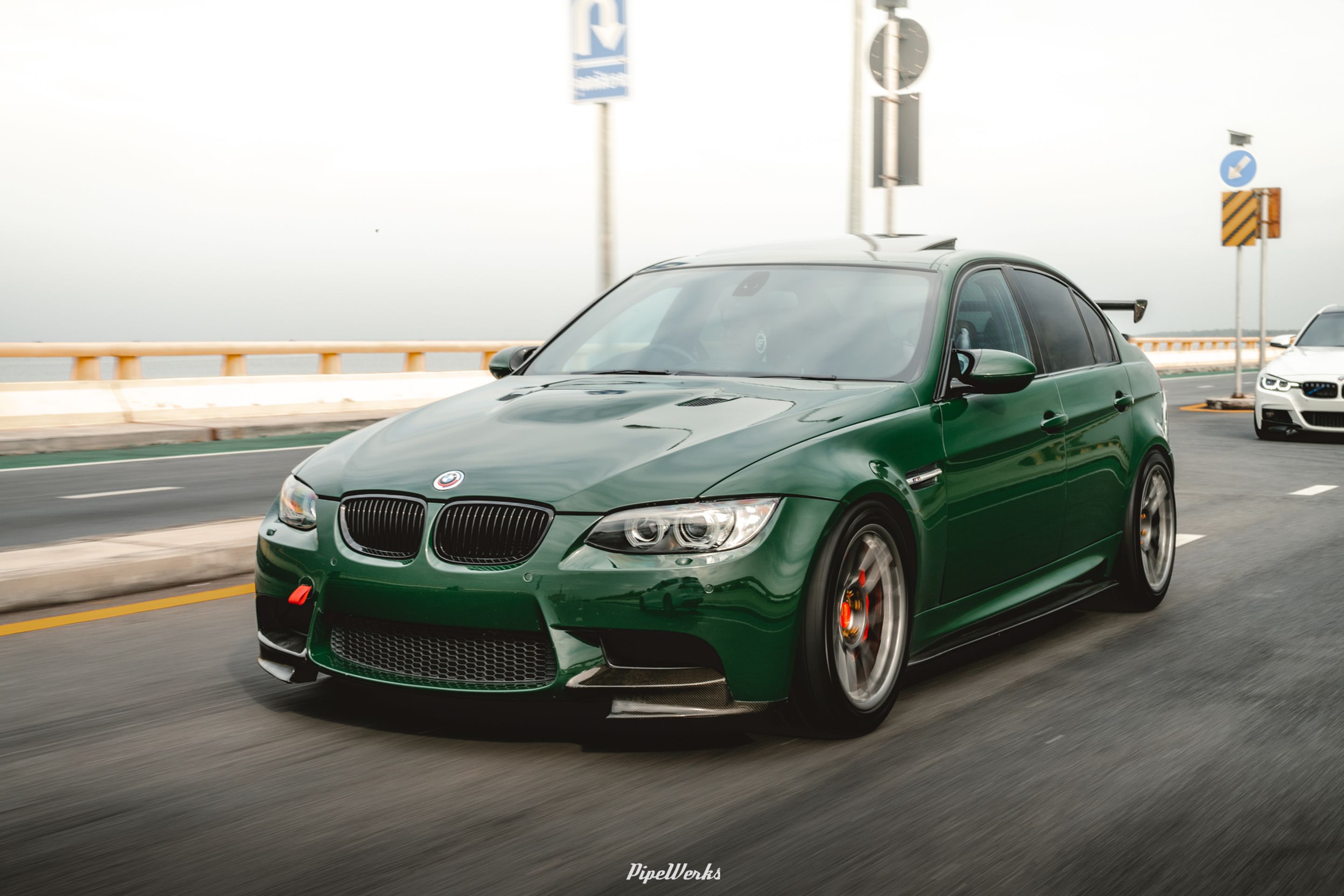 Green BMW E90 Sedan 3 Series with 18" ARC-8 Apex wheels in Anthracite