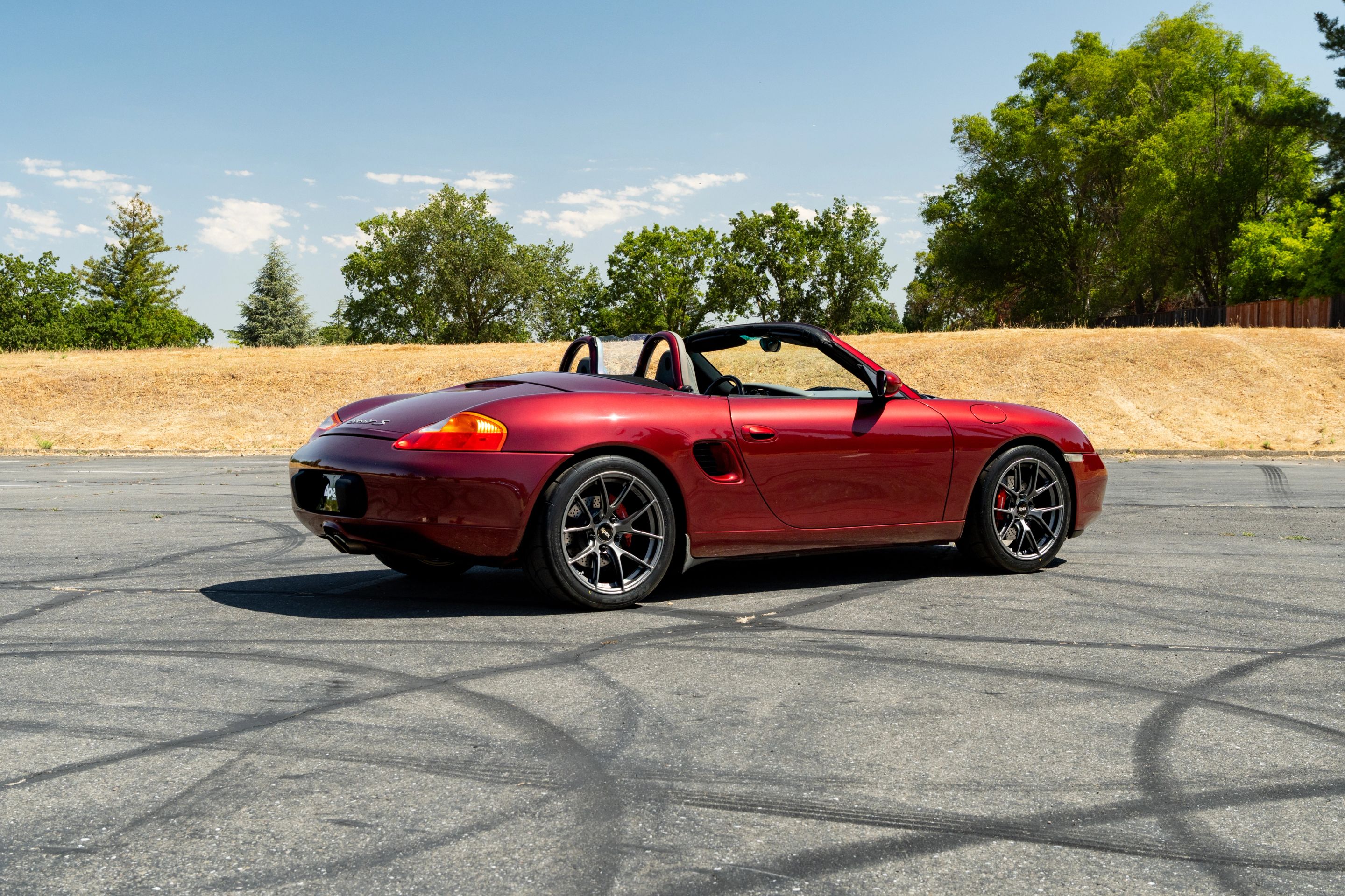 Red Porsche 986 Boxster with 18" VS-5RS Apex wheels in Anthracite