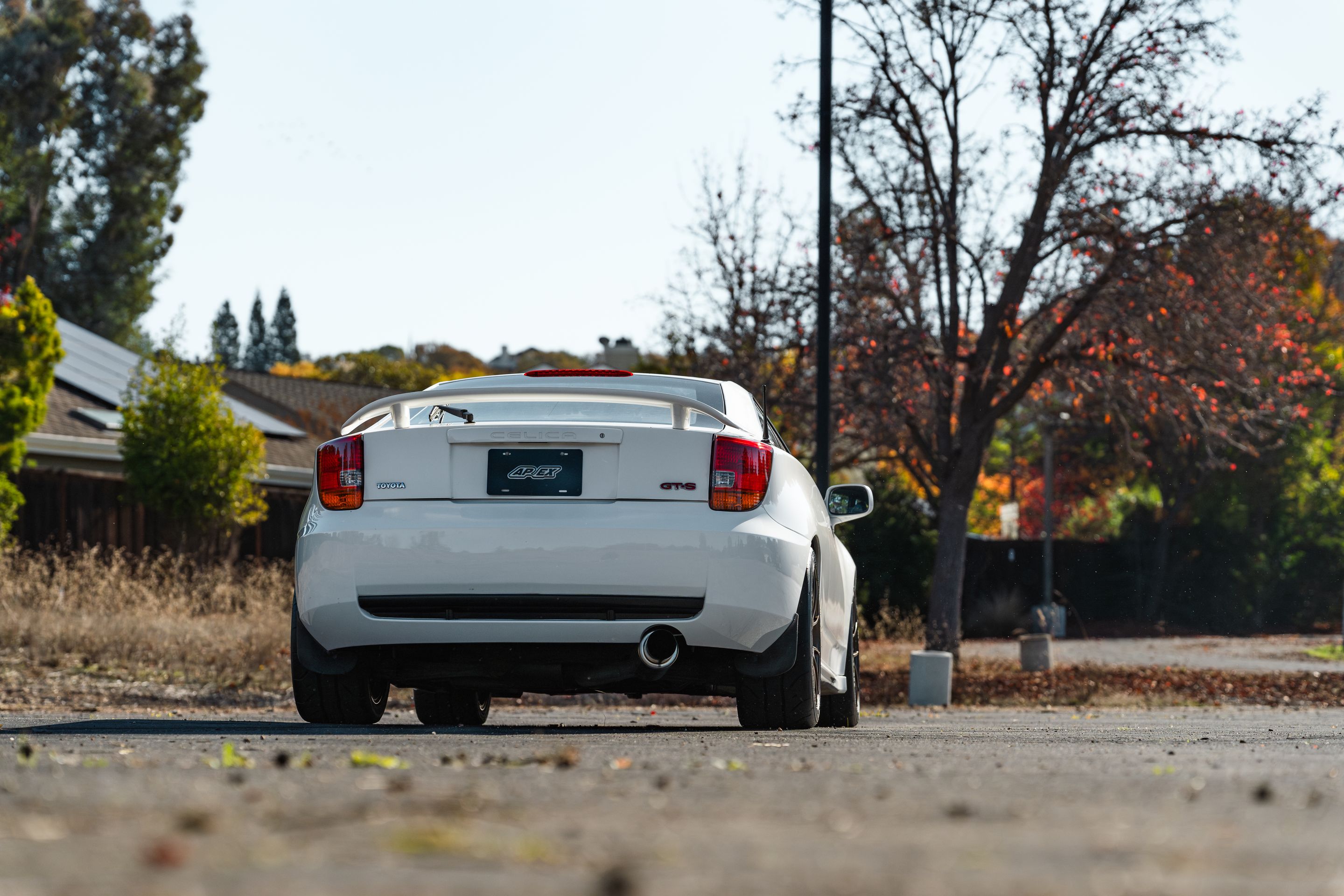 White Toyota 7th Gen Celica with 17" VS-5RS Apex wheels in Satin Bronze