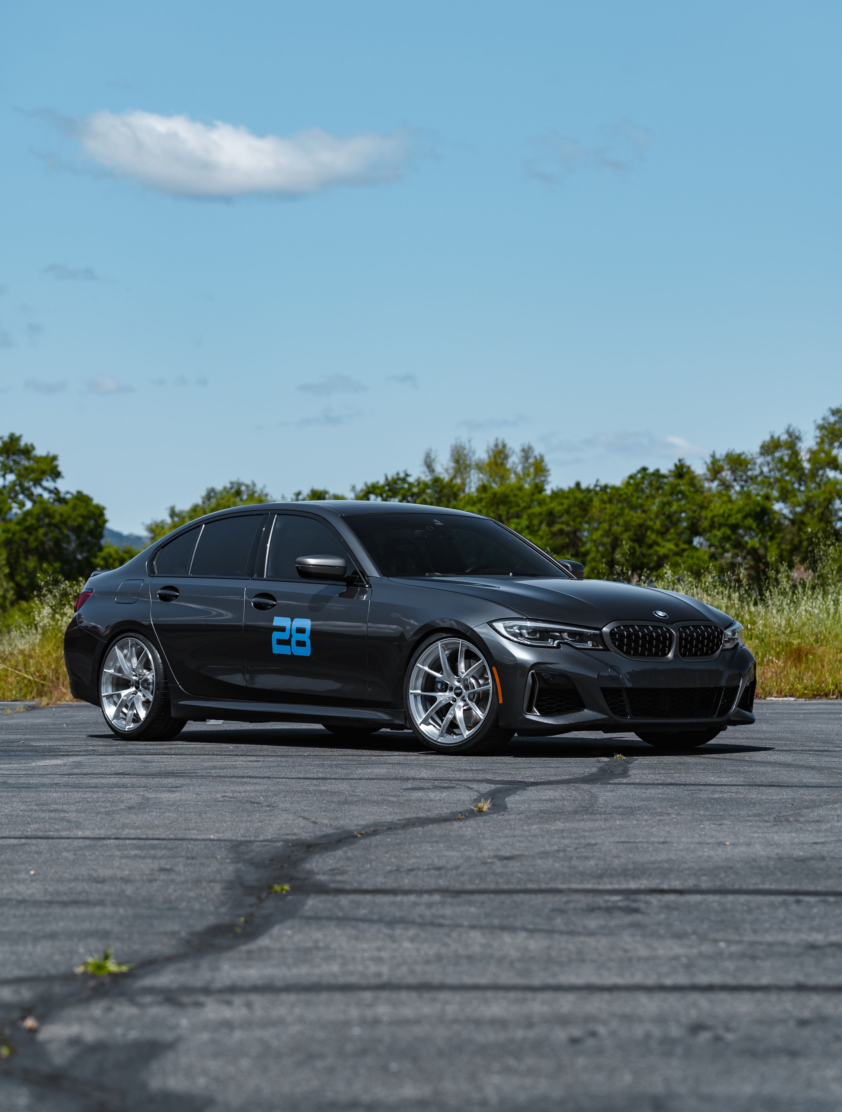 Grey BMW G20 Sedan 3 Series with 20" VS-5RS Apex wheels in Brushed Clear