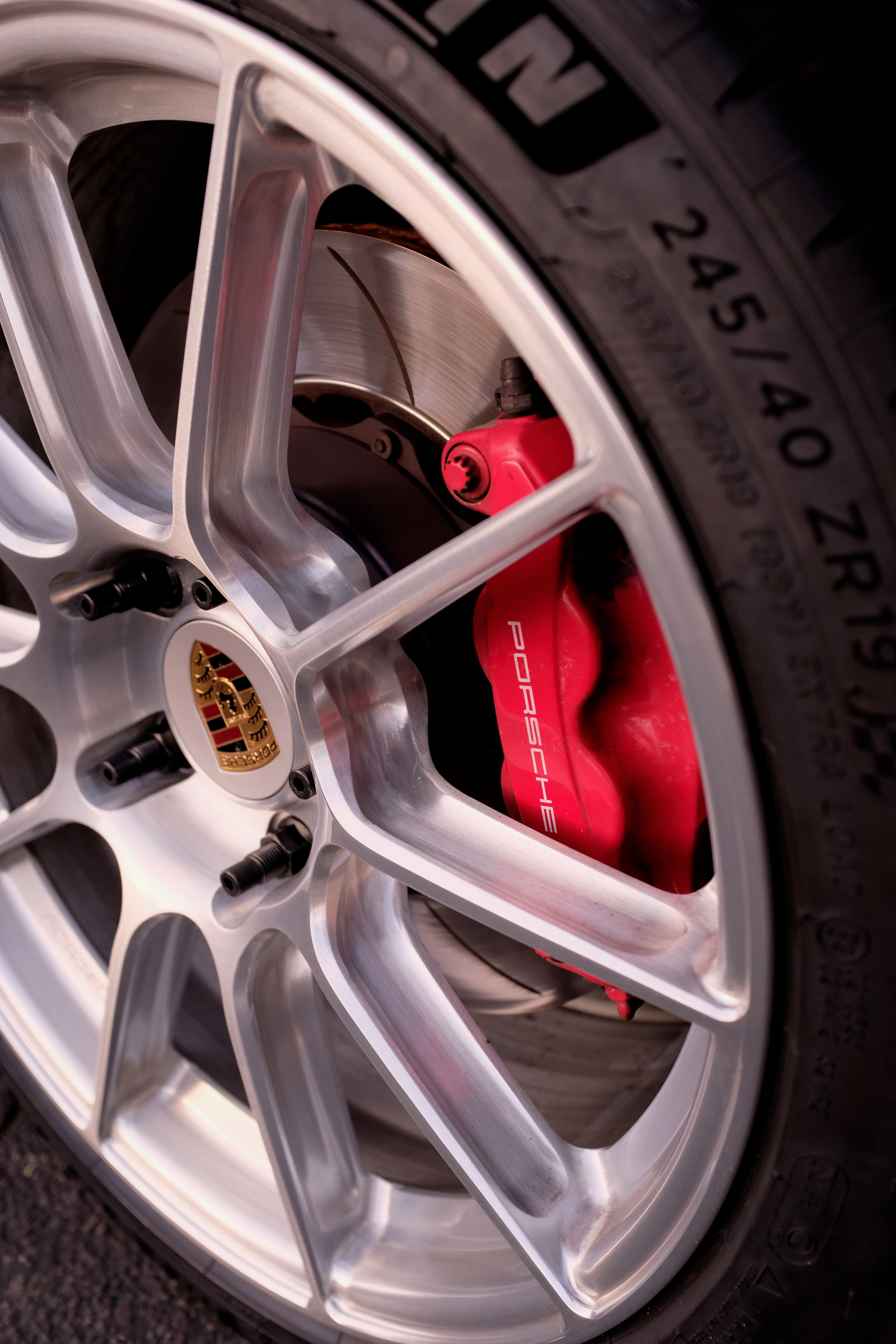 Black Porsche 981 Cayman S with 19" SM-10RS Apex wheels in Brushed Clear