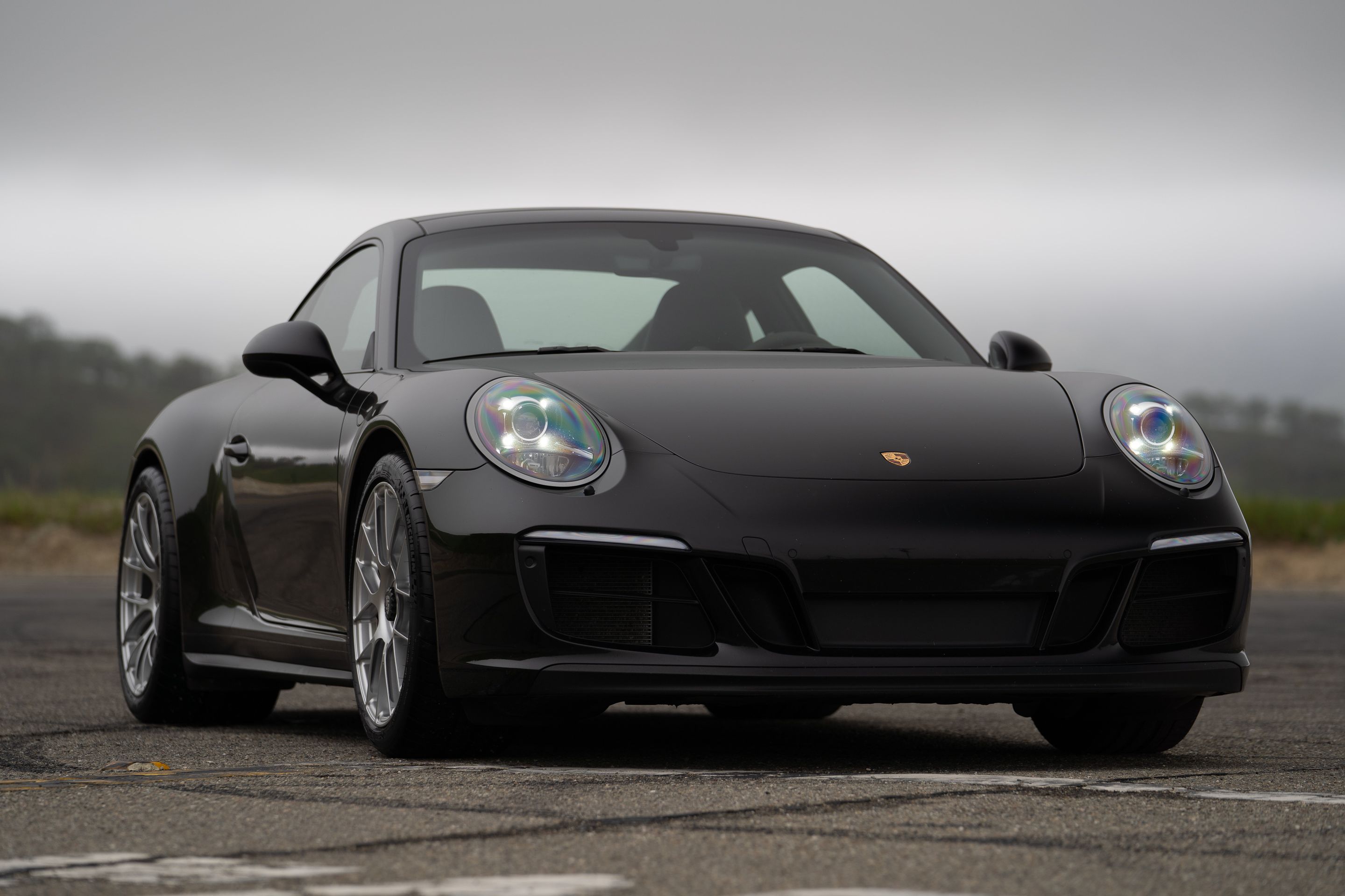 Black Porsche 911 991.2 Carrera GTS with 19" EC-7RS Apex wheels in Race Silver